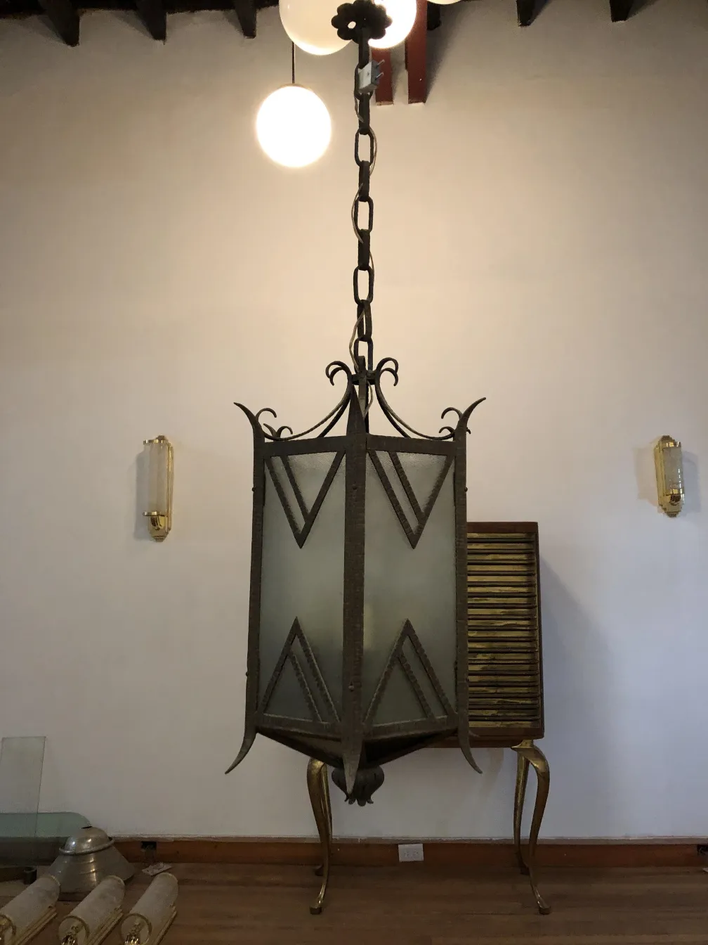 Antique hanging lantern with elegant design, perfect for decoration.