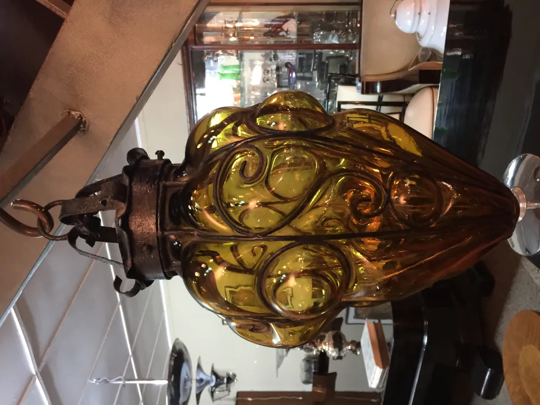antique yellow glass lantern with metal details