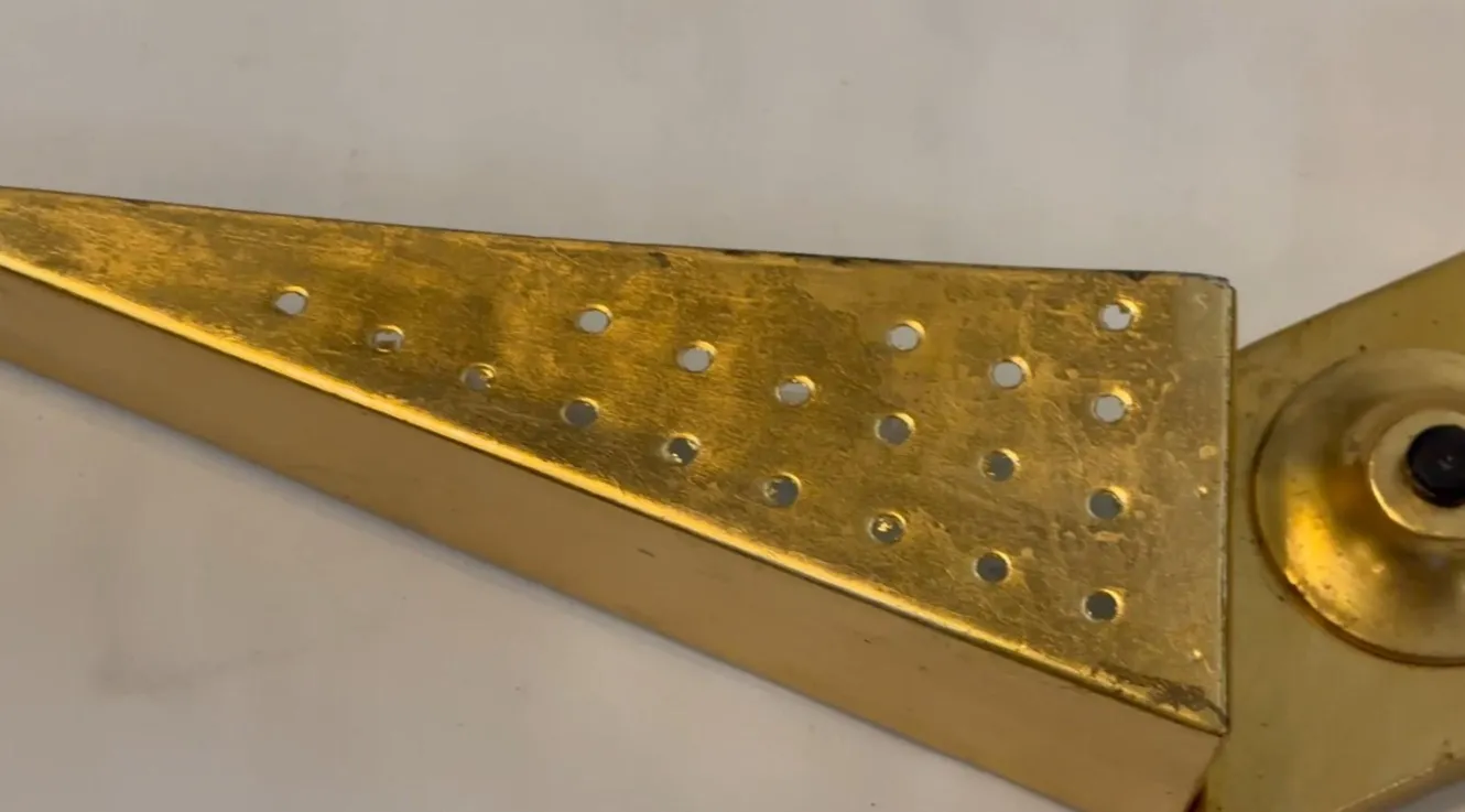 applique da parete antica con finitura dorata e fori decorativi 1950