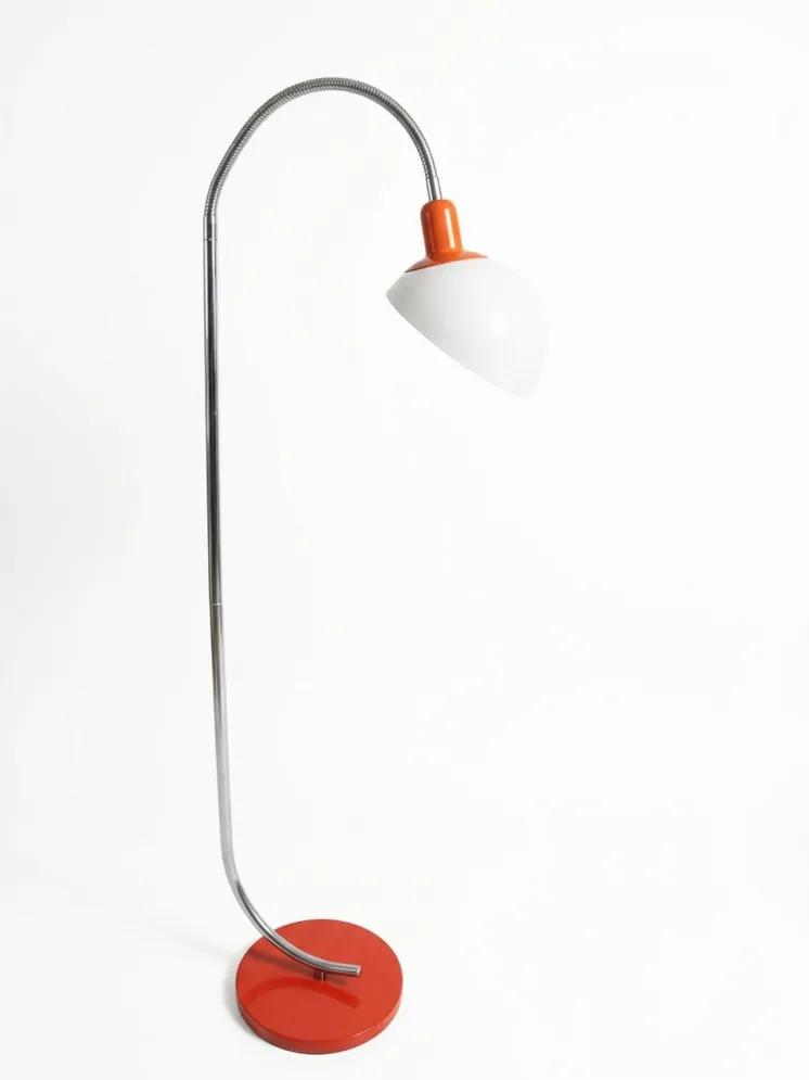 Antique floor lamp in Art Deco style with red base.