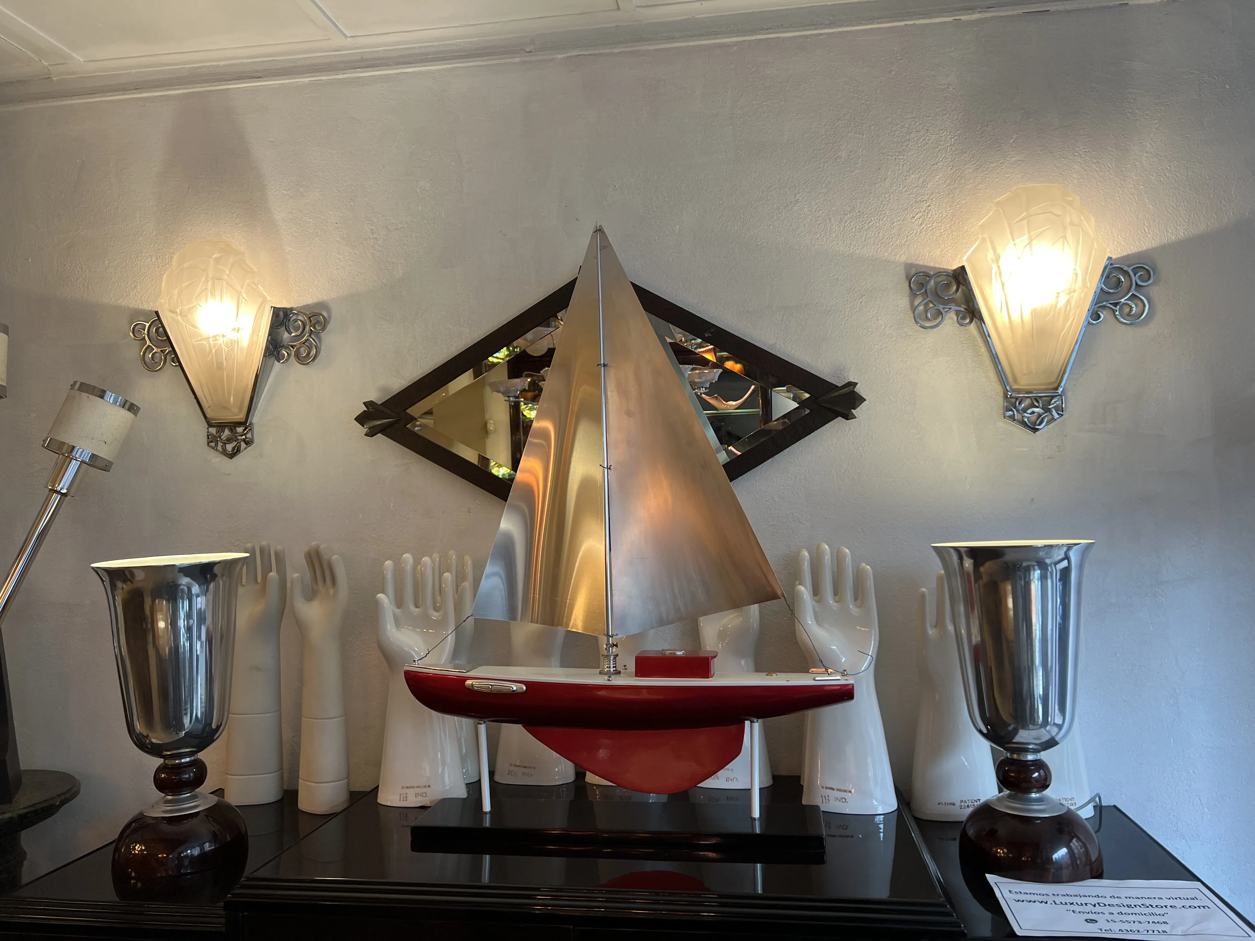 pair of antique sconces elegantly illuminating a wall.