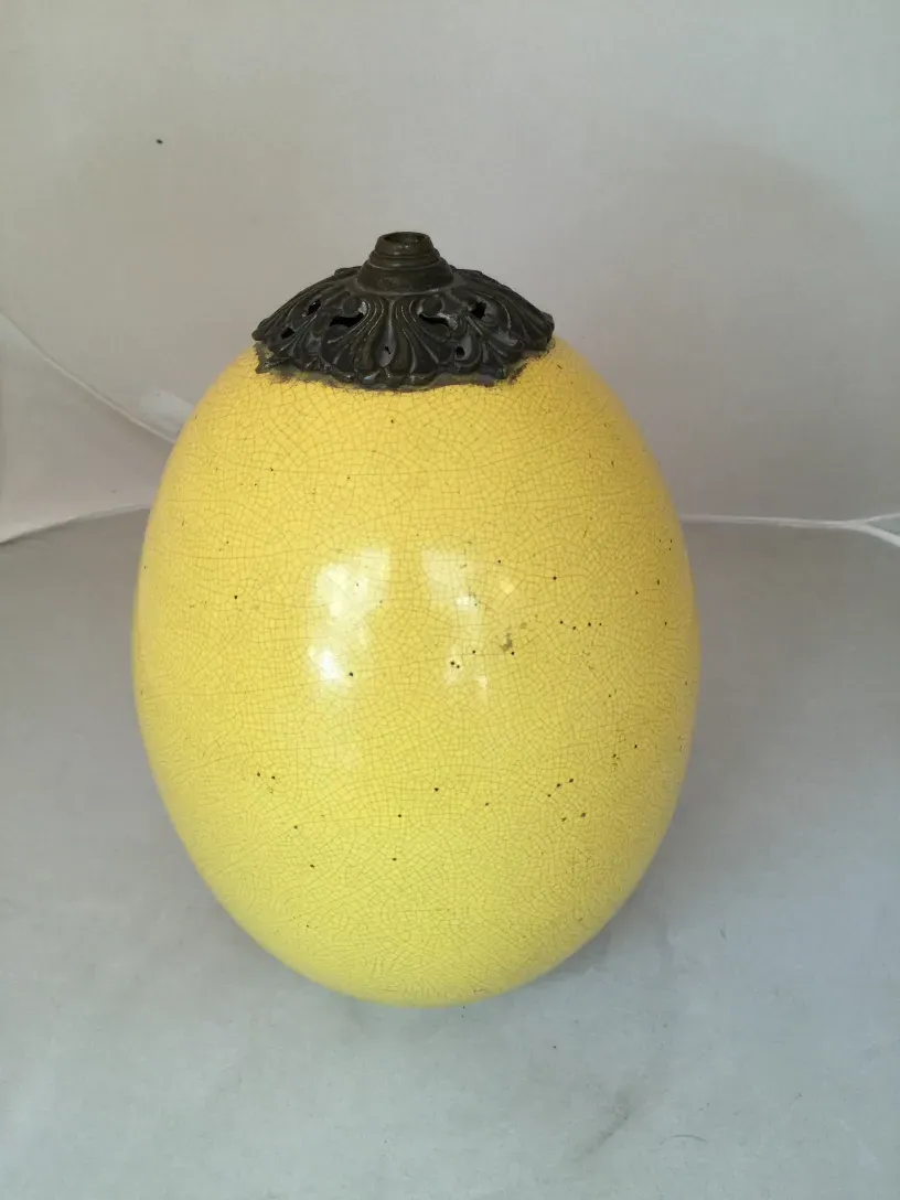 antique round table lamp in yellow with decorative base