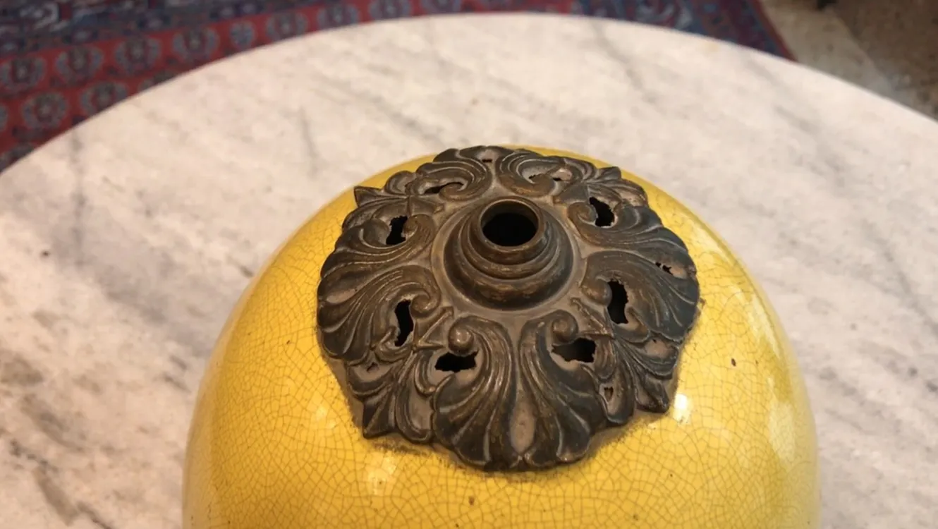 antique table lamp in yellow with art deco design