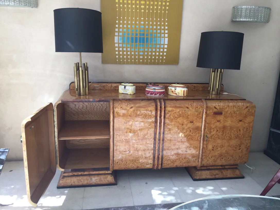 antique art deco table lamp with black shade and gold base, decorating furniture