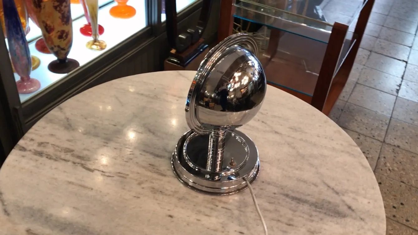 antique table lamp with chrome base and elegant design