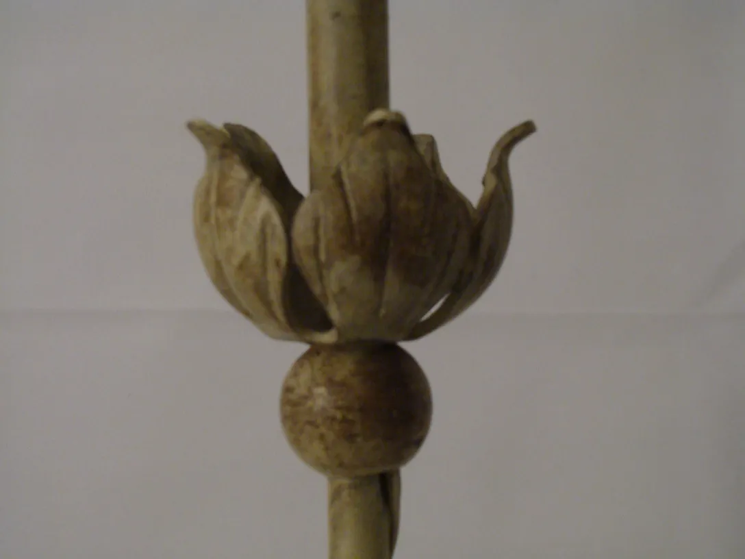 Antique table lamp with Art Deco design and decorative details.