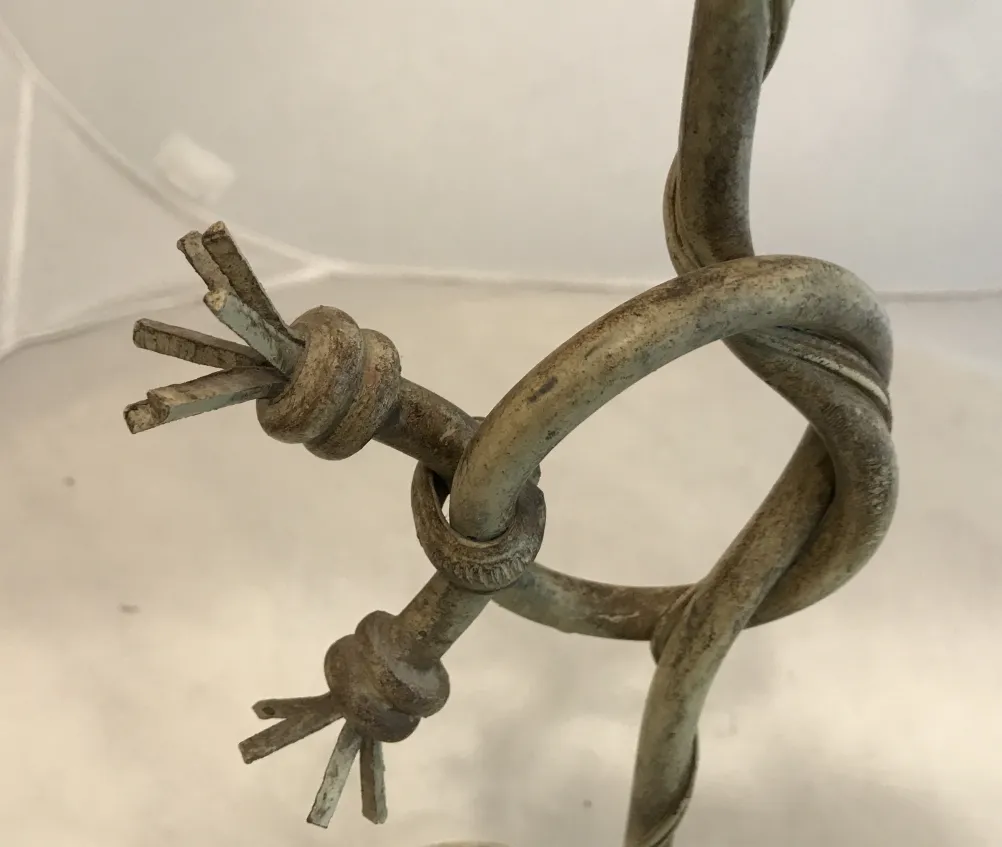 Antique Art Deco table lamp with unique decorative details. Perfect for enhancing spaces.