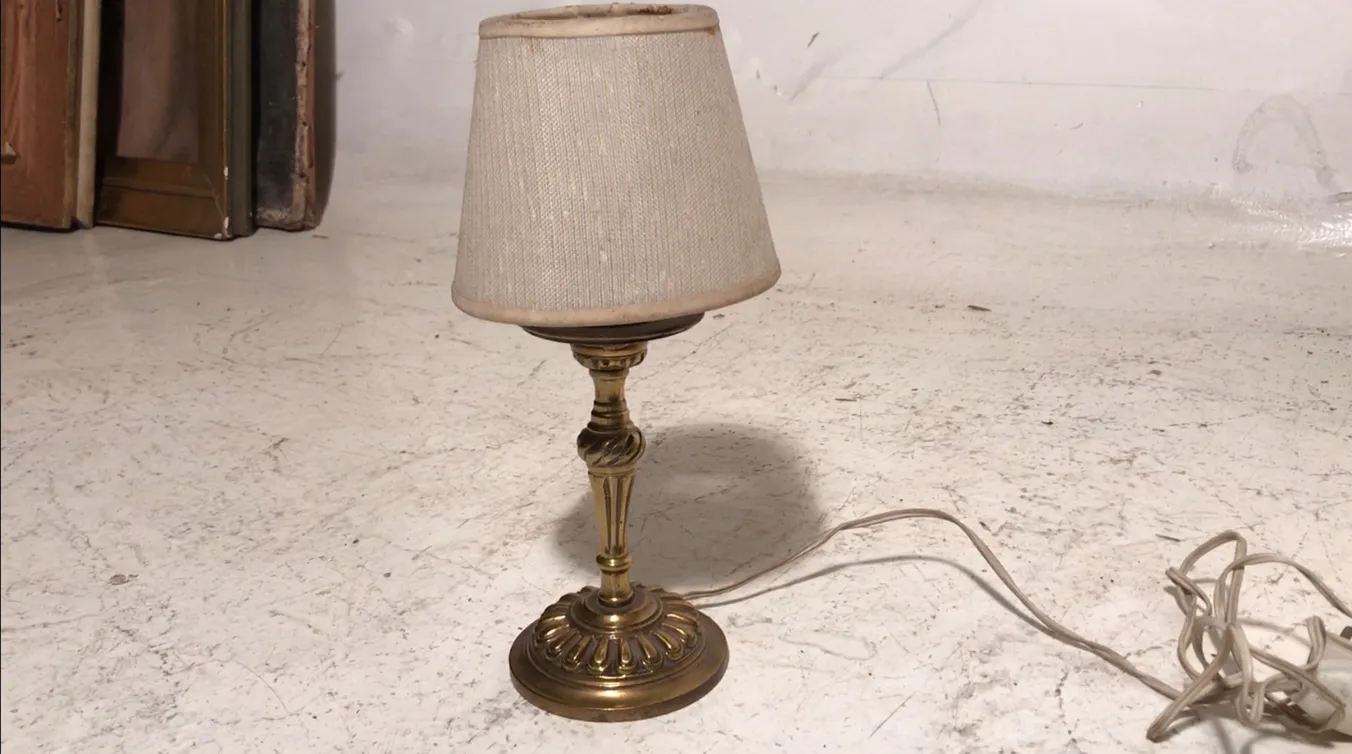 antique table lamp art deco with clear shade, decorative background