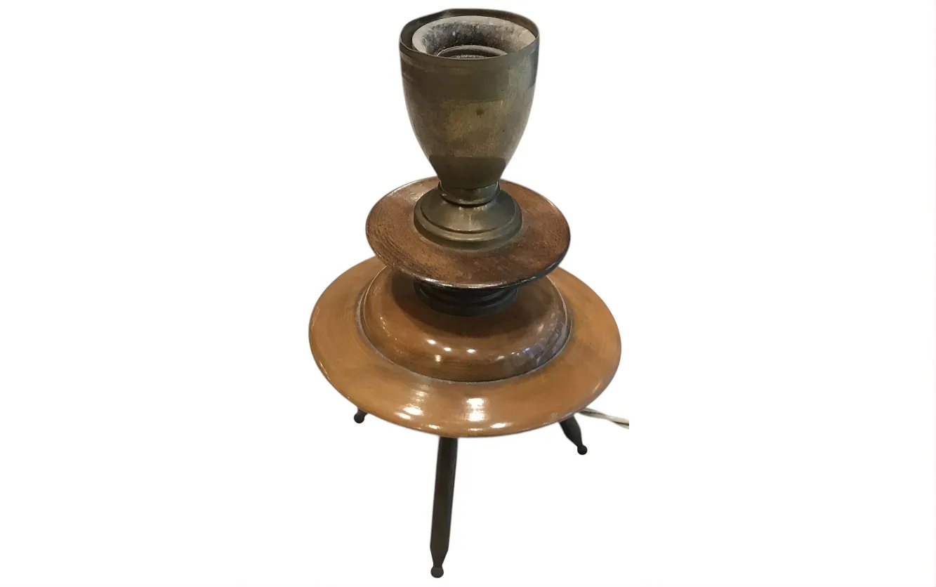 Antique table lamp in Art Deco style with decorative base.