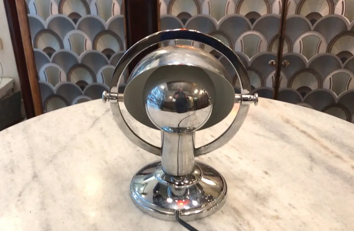 antique table lamp art deco with round base and sphere
