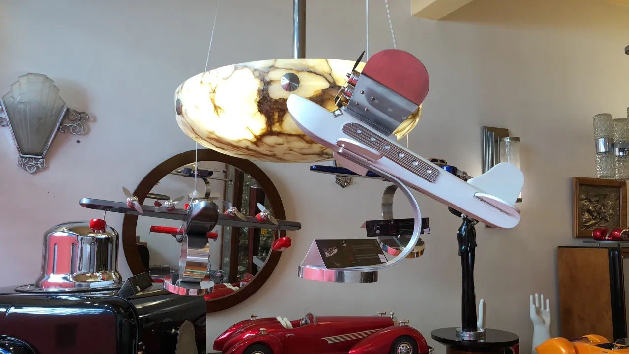 hanging model of an antique aircraft in modern decor