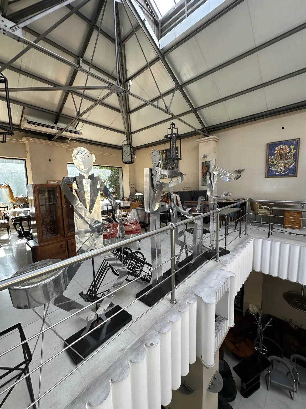 sculptures of the designer's music band in an antique setting