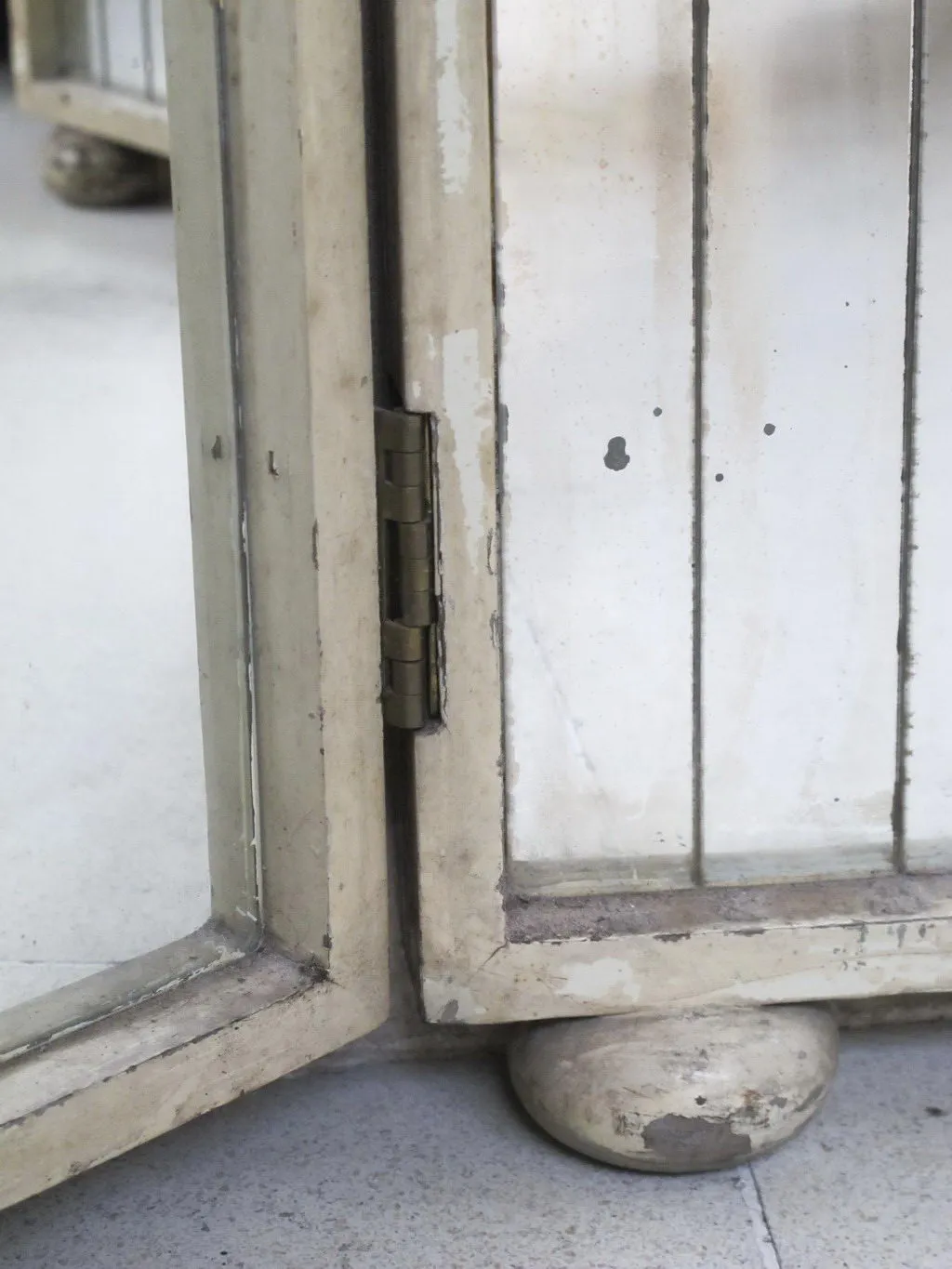 antique art deco mirror with corner details