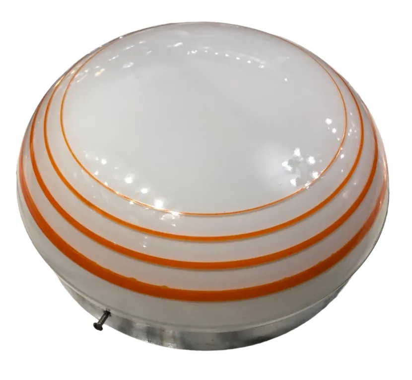 Three antique spherical ceiling lights with subtle details