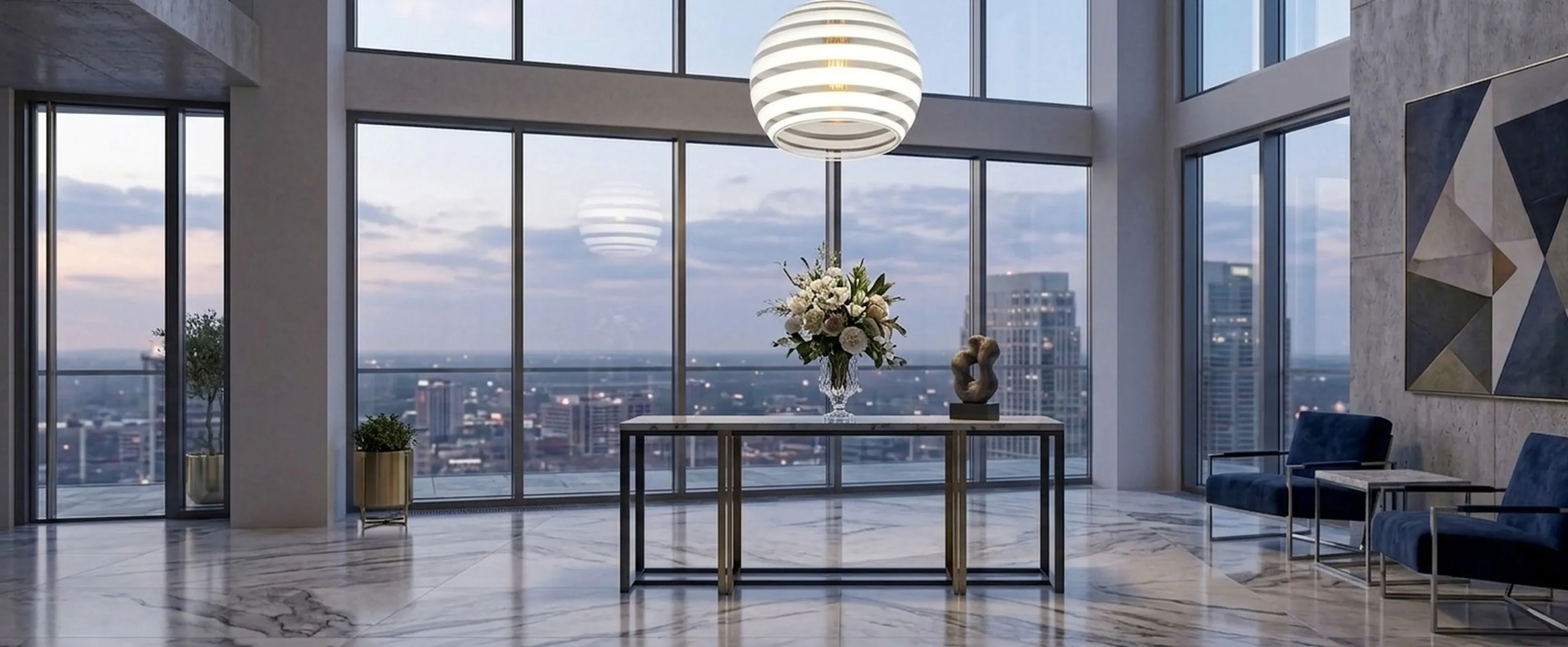 Lampada a sospensione antica di stile moderno di Paolo Venini in una sala moderna con vista.