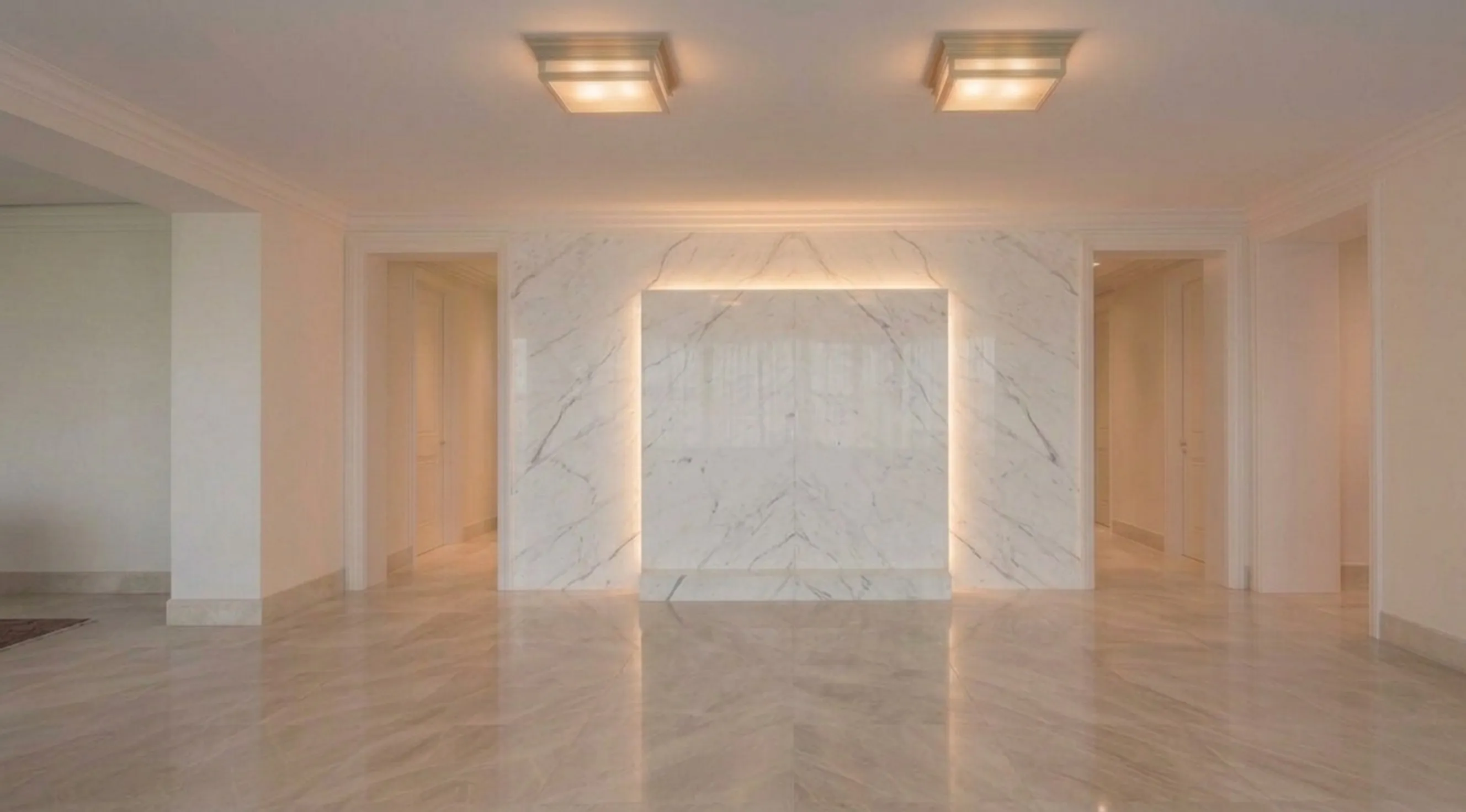 two antique ceiling lights illuminating a spacious hallway