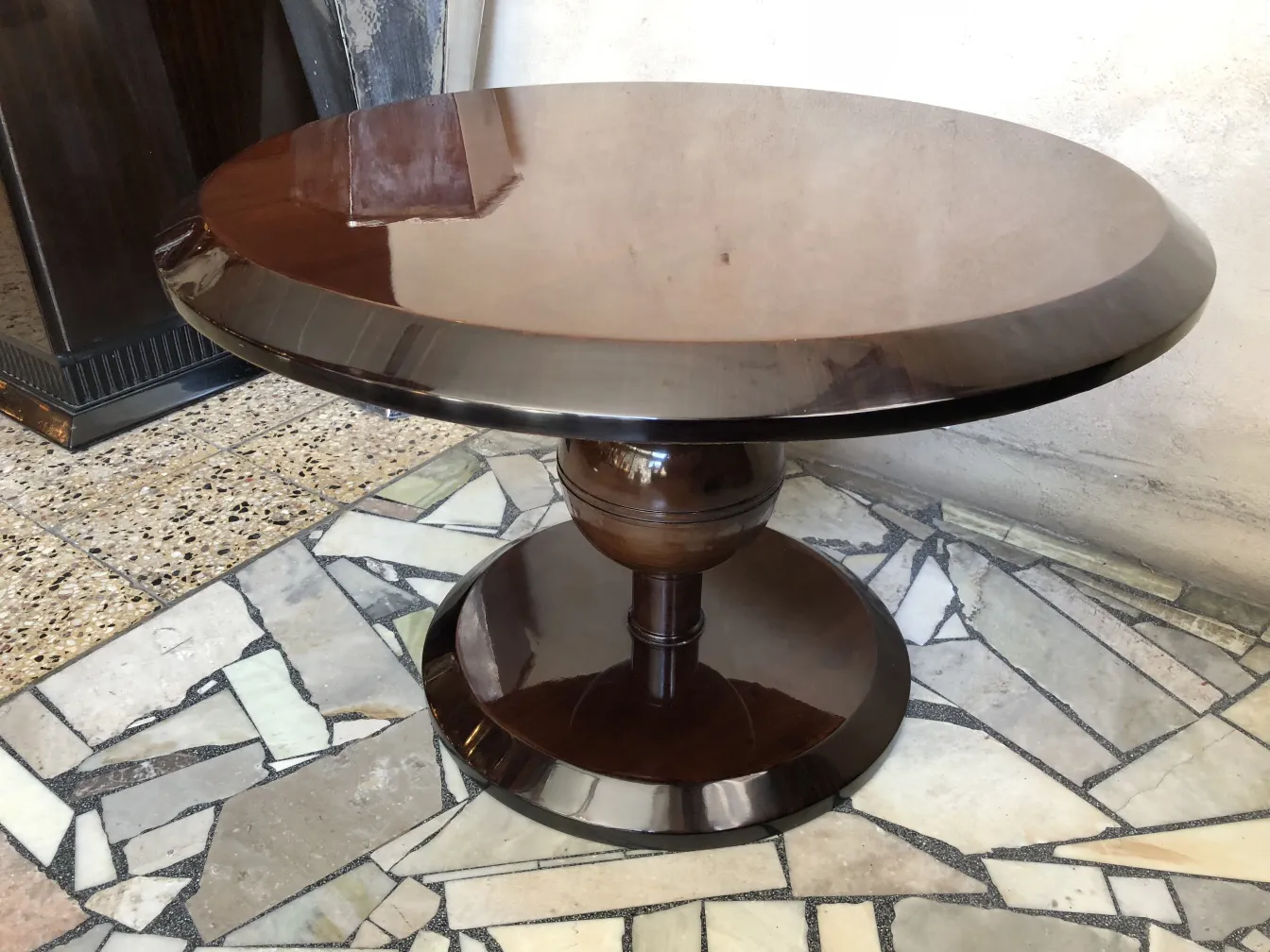 Antique coffee table with elegant design, distinctive setting.