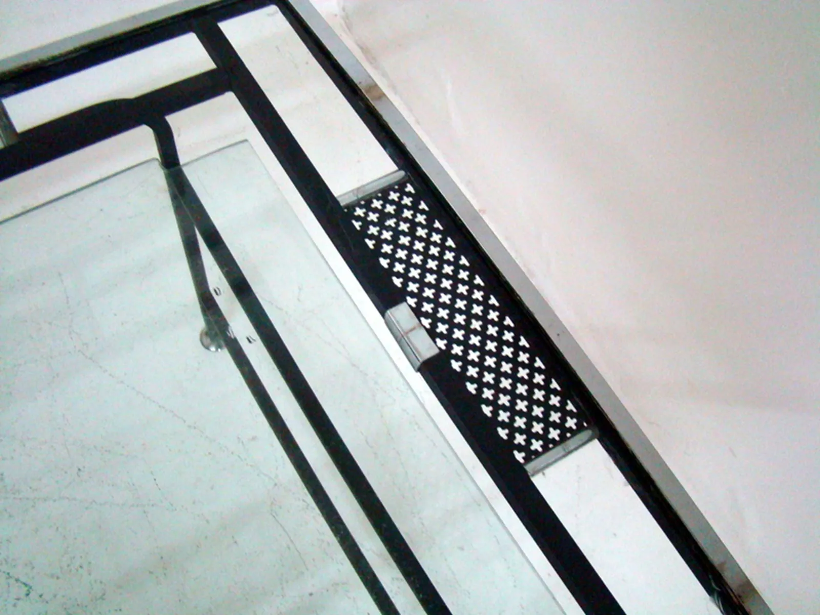 Antique coffee table with unique design, featuring artistic details in a cozy setting