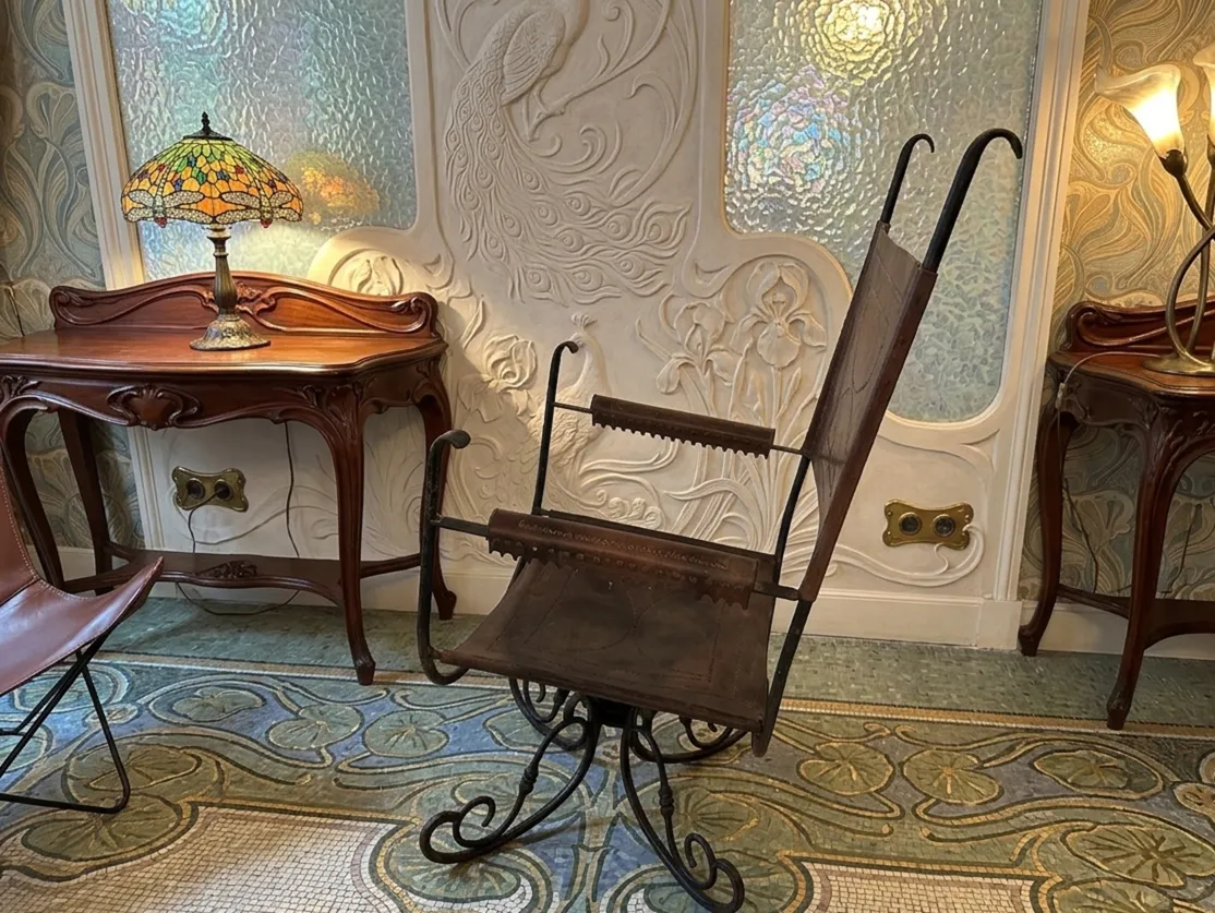 Antique Art Deco armchair with elegant and unique design, softly lit background