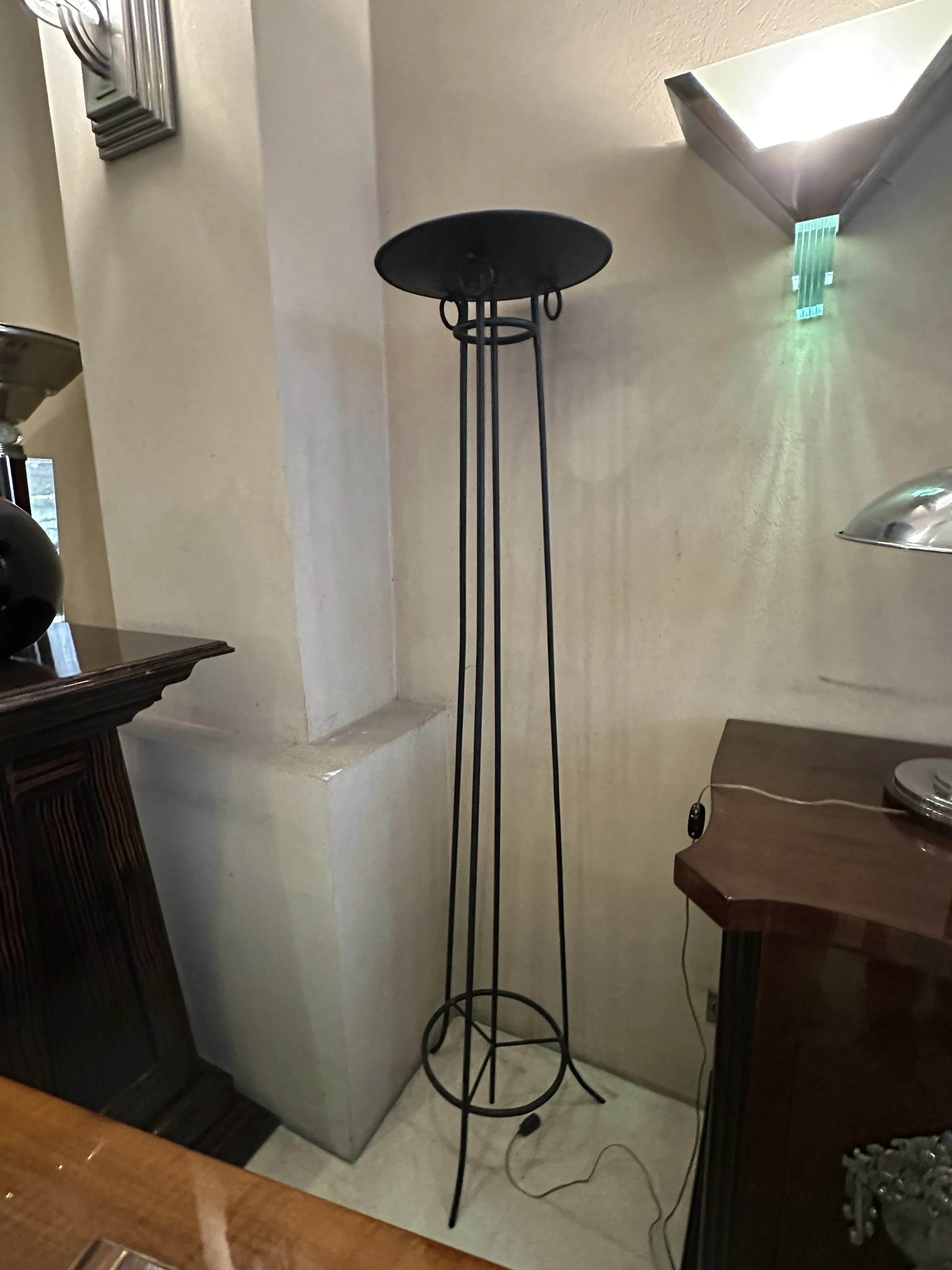 4 antique floor lamps in a cozy setting with decorative details