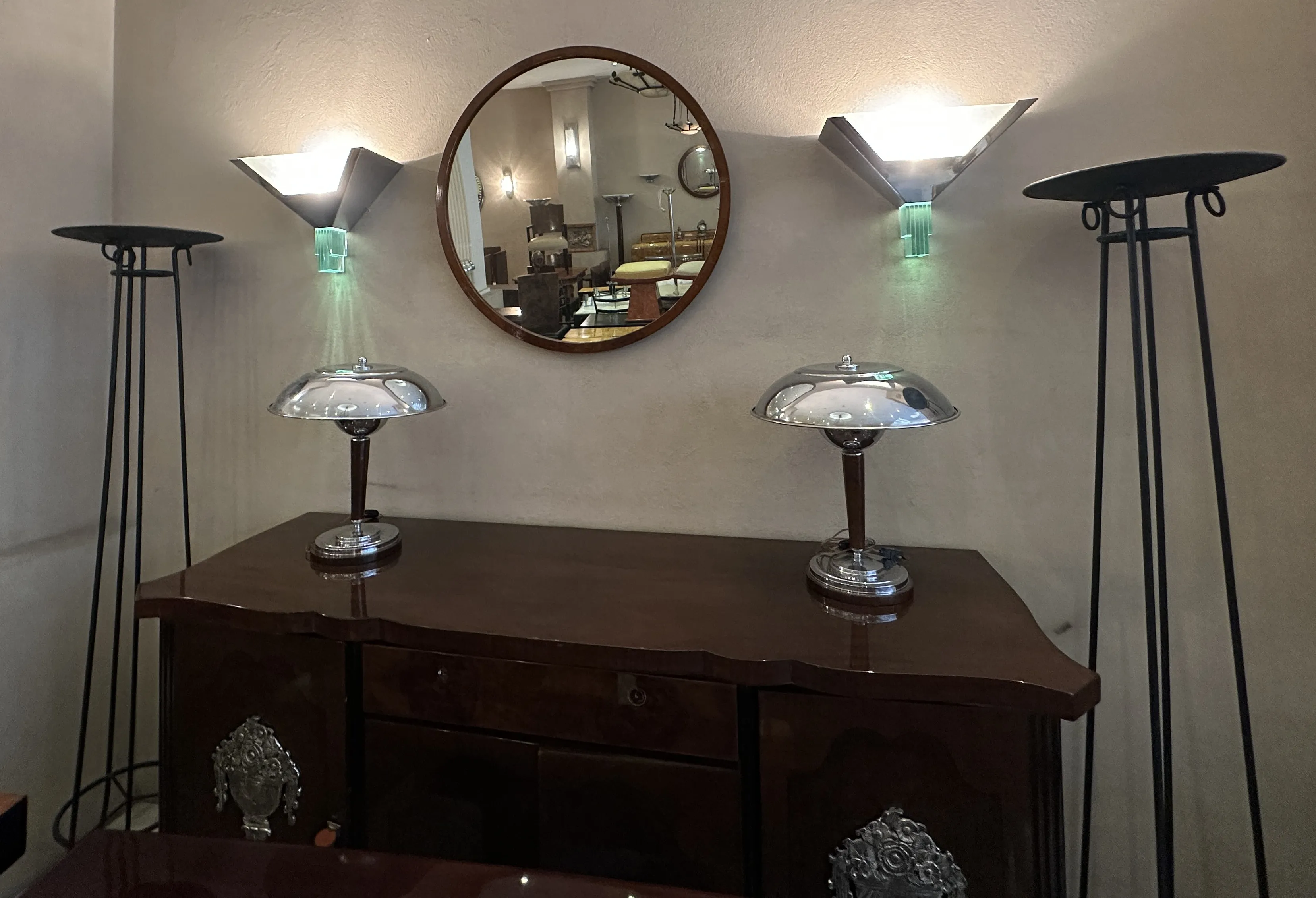 4 antique floor lamps in an elegant setting with mirrors