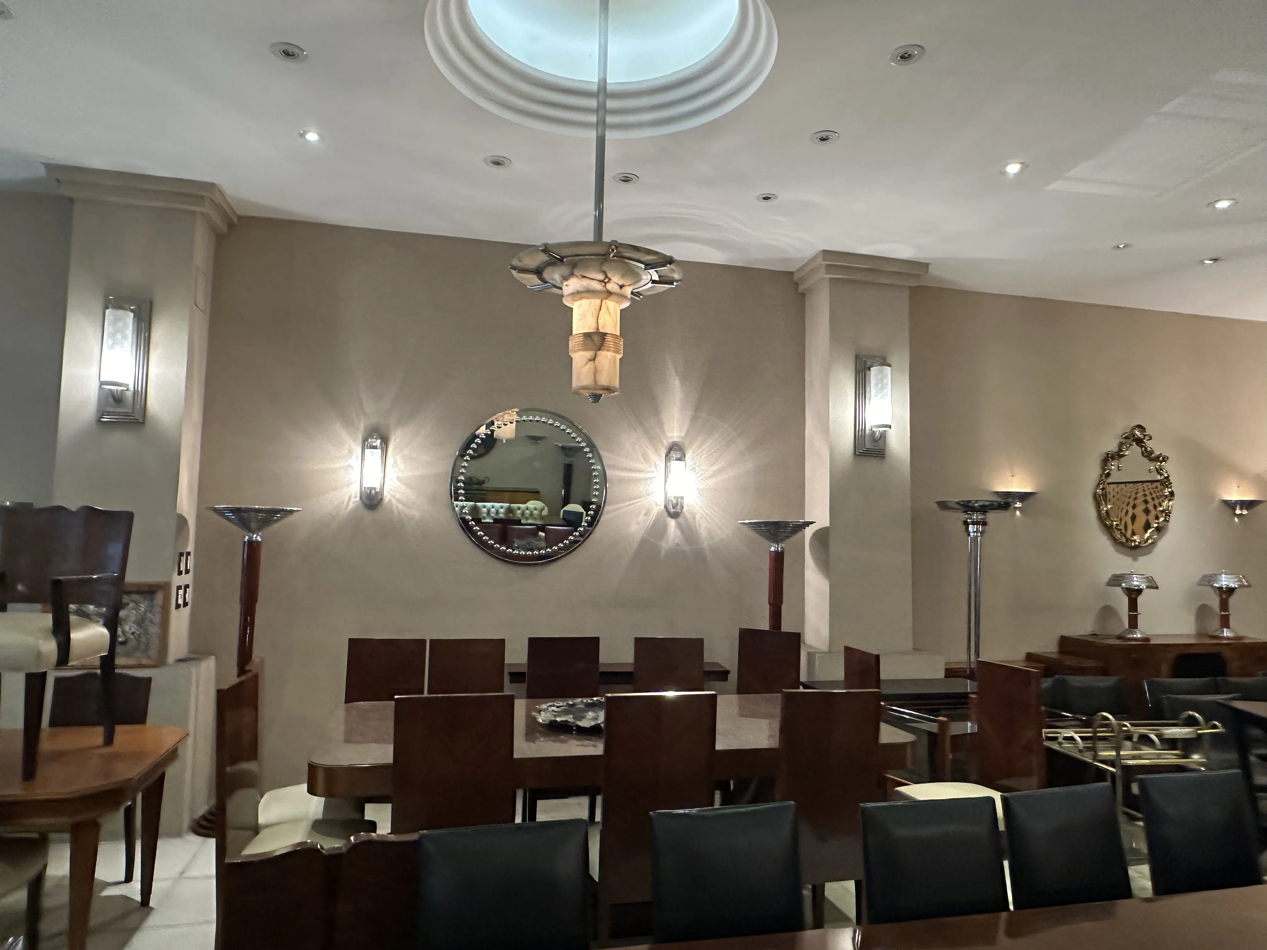 Image of 2 antique hanging lamps in an elegant setting.