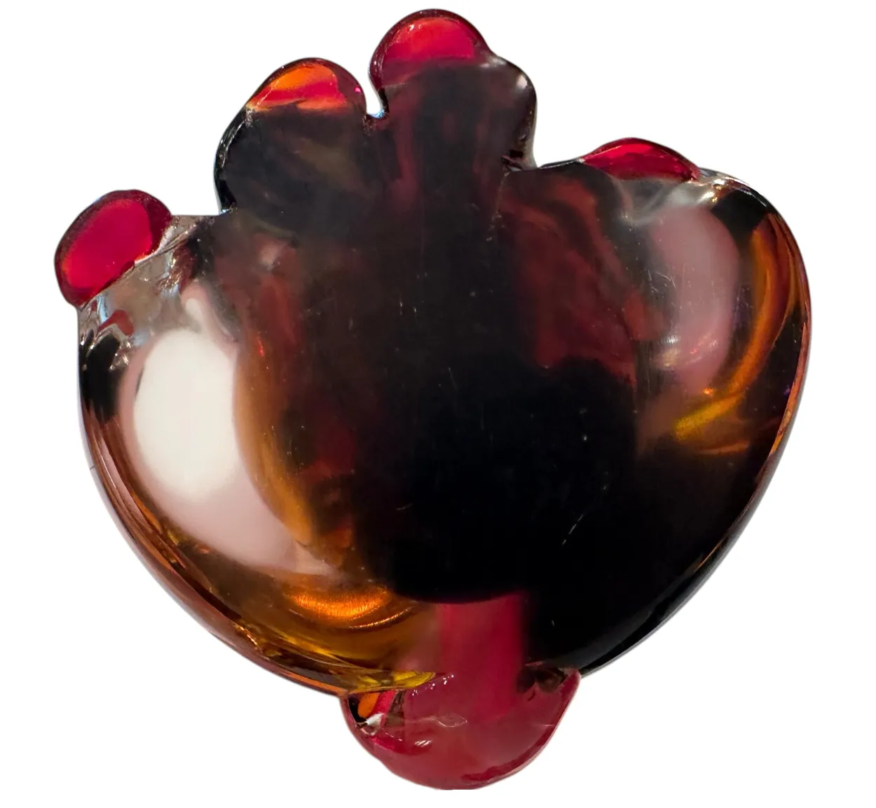 Antique Murano sculpture with vibrant warm color details and organic shape.