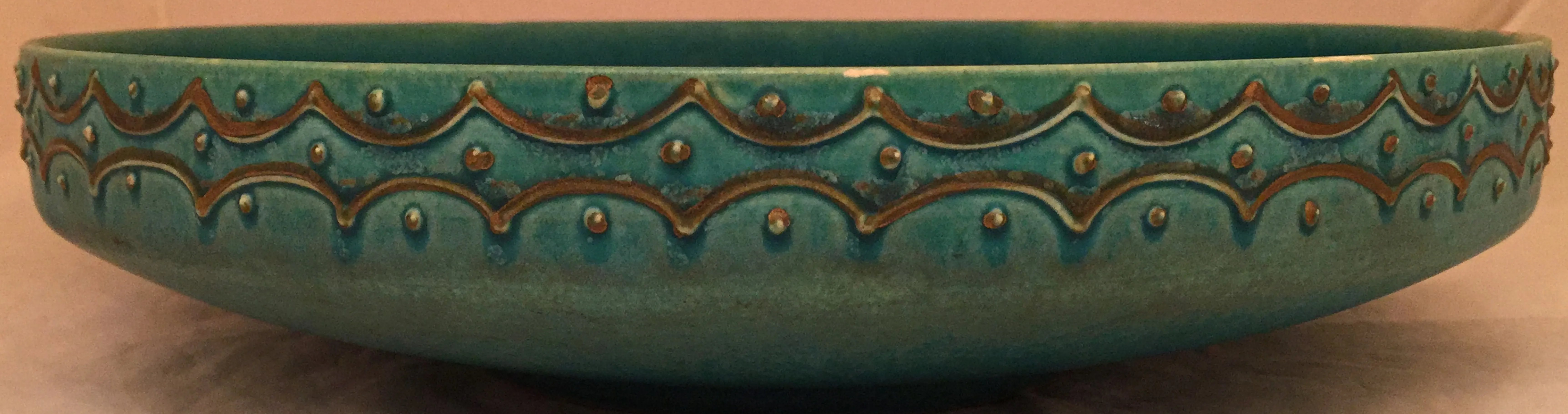 antique blue ceramic with wavy patterns and dots