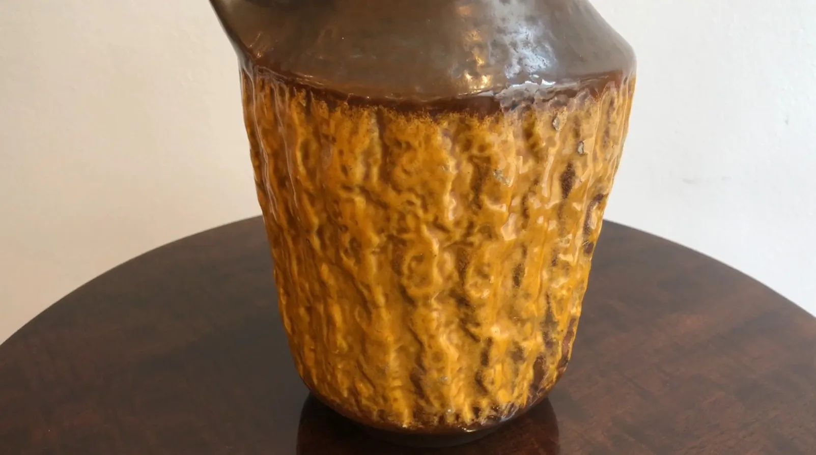 antique ceramic jug with unique texture