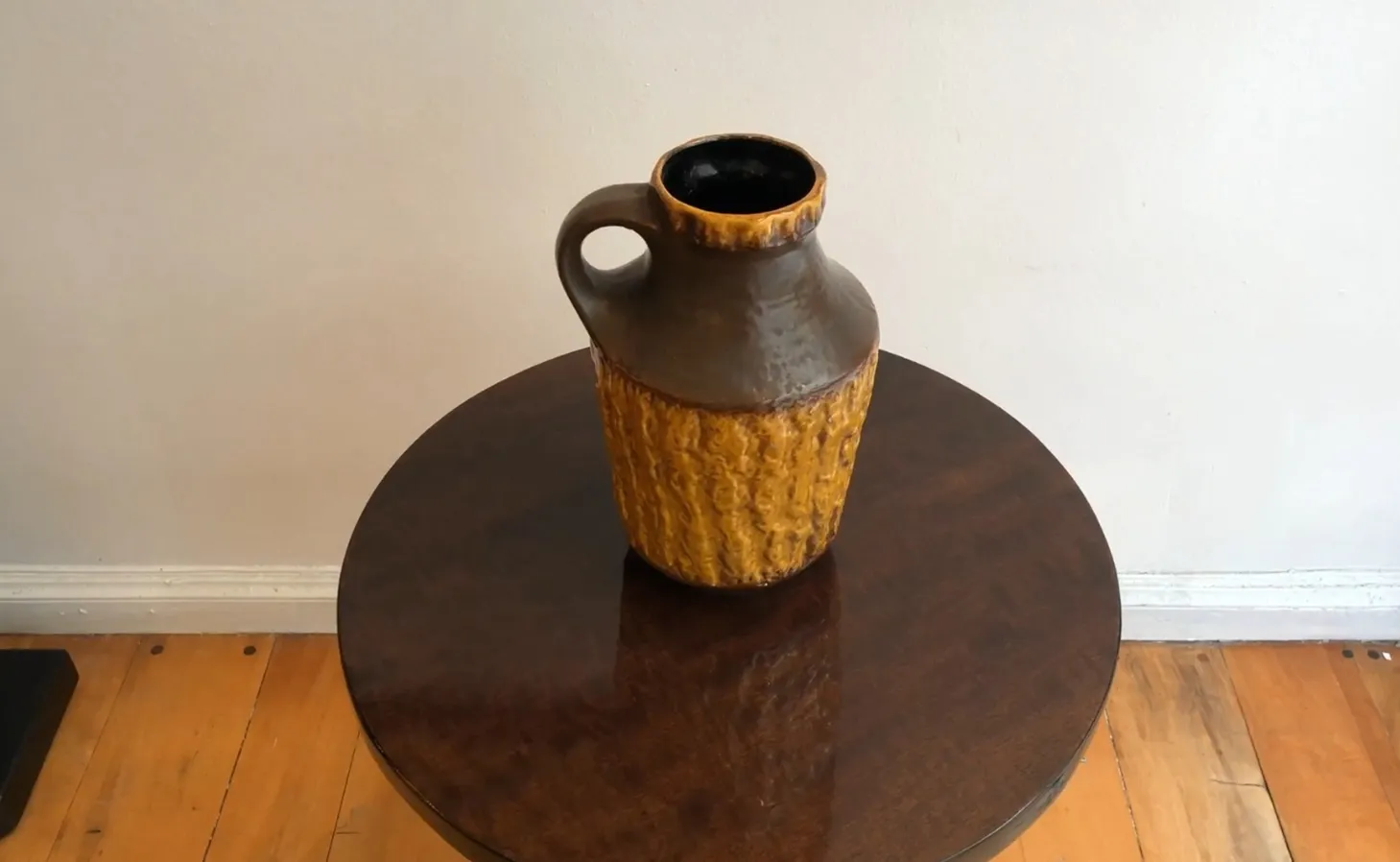 antique ceramic jug with unique texture