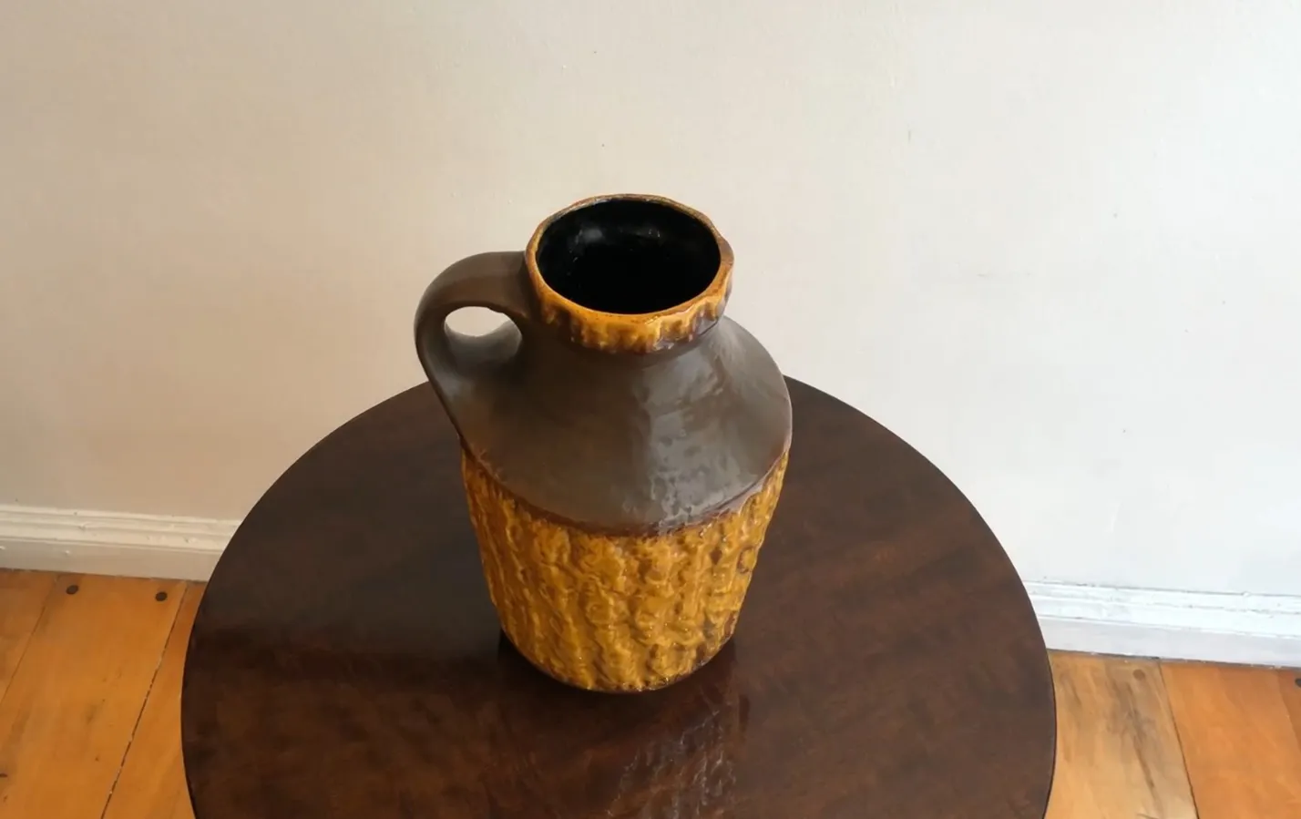 antique ceramic jug with unique texture