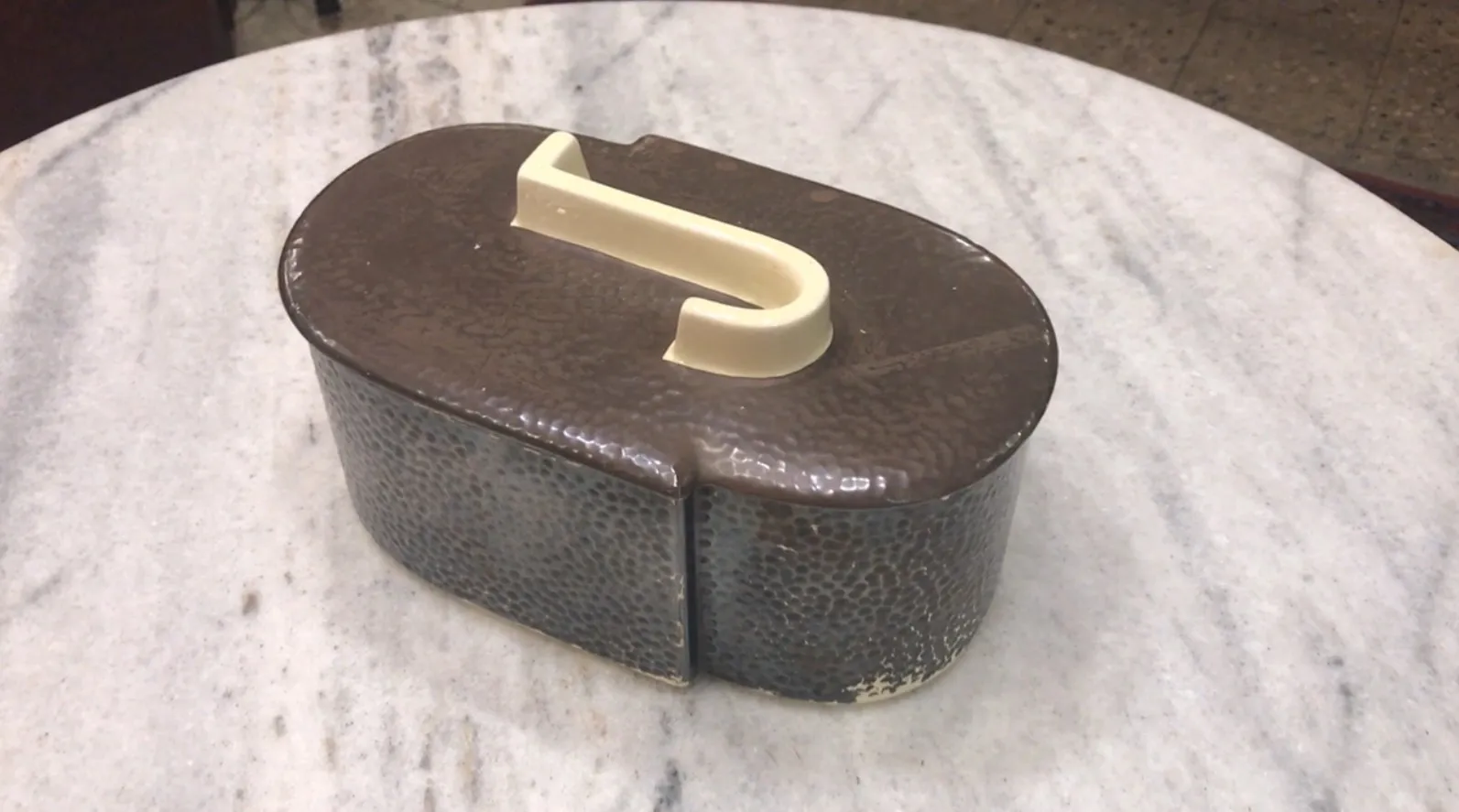 antique decorative box with clear lid in elegant setting