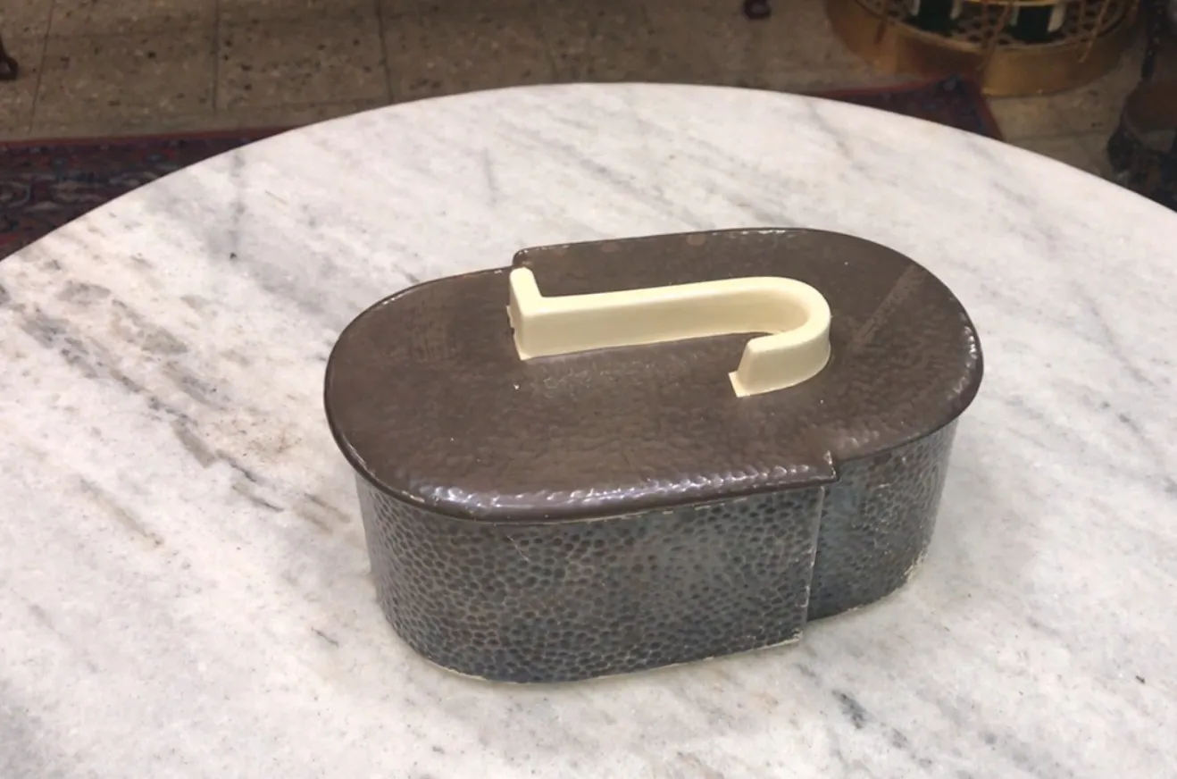 antique decorative box with clear lid in elegant setting