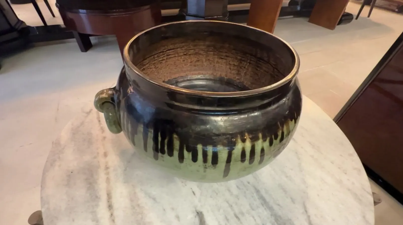 Antique gold ceramic with handles and dark details