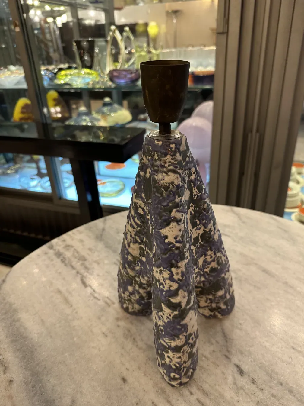 antique table lamp with an exclusive purple design on a marble table
