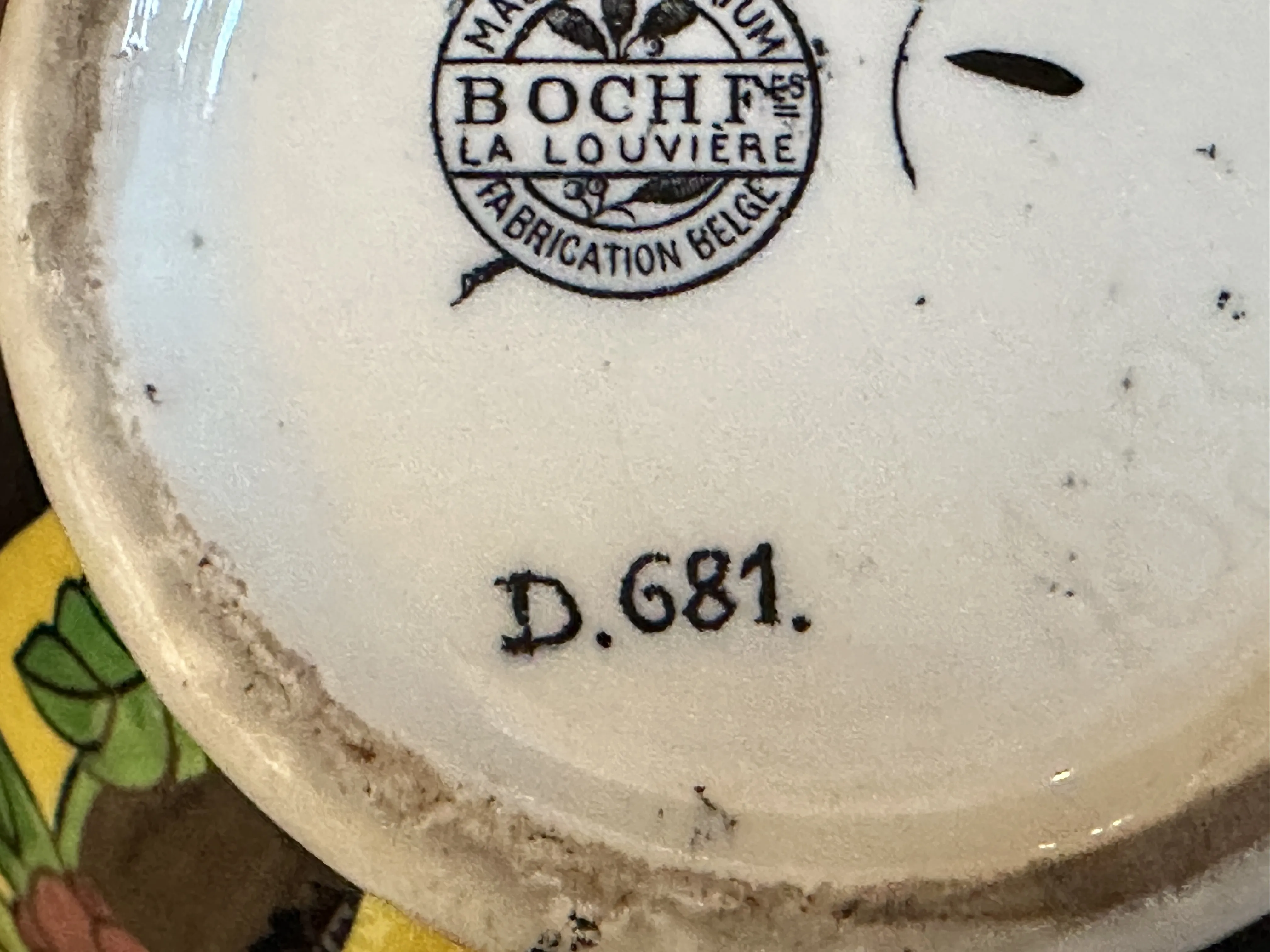 Antique ceramic of Boch Frères Keramis with decorative details.