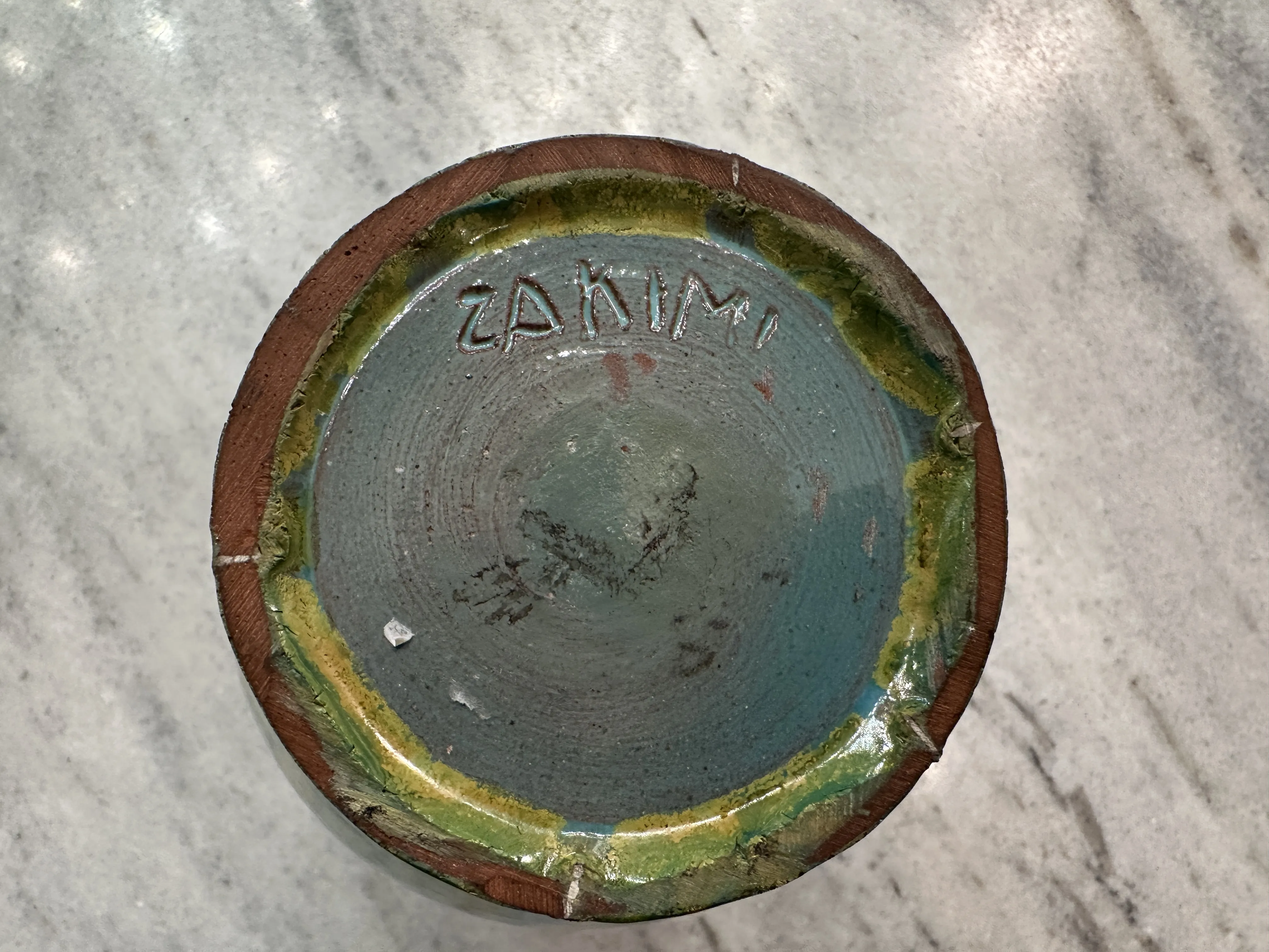 Antique ceramic by Zakimi with decorative details