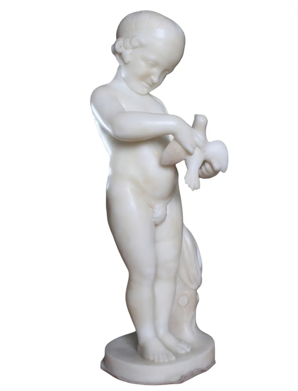 antique sculpture of a child holding a bird