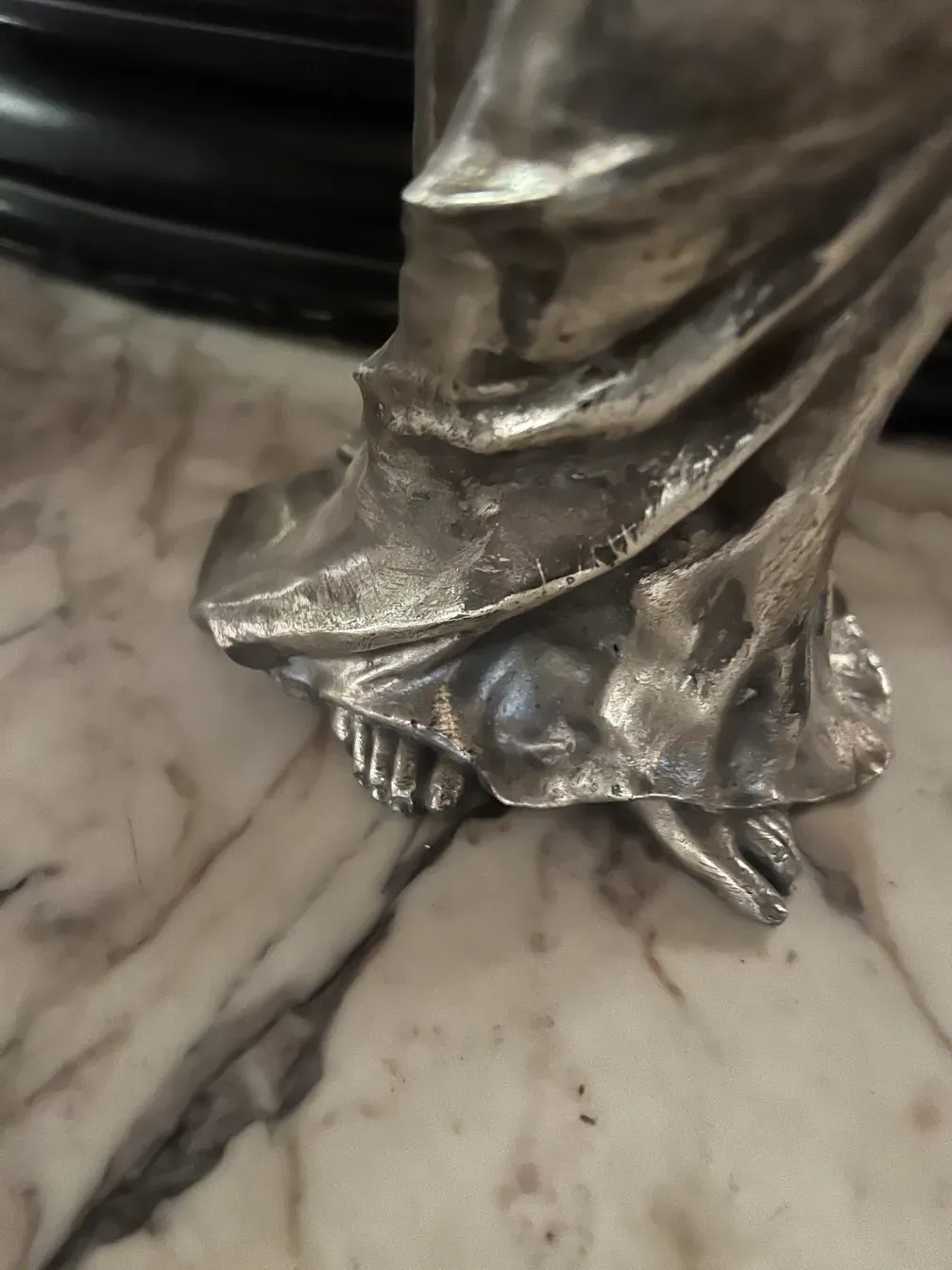 base of an antique sculpture with details