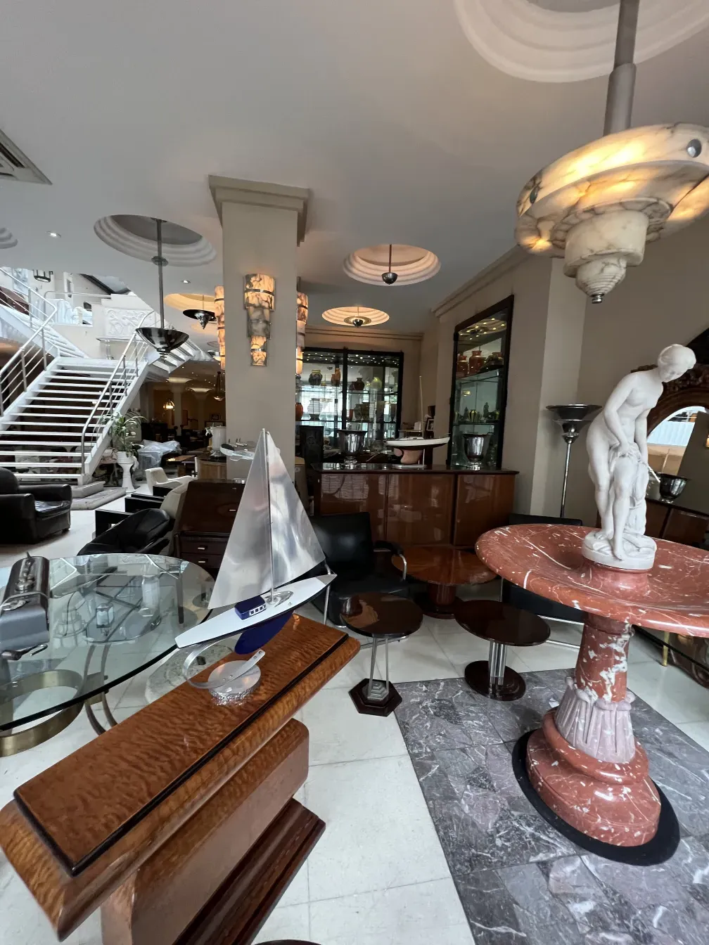 Antique decorative fountain in an elegant setting with marble and objects