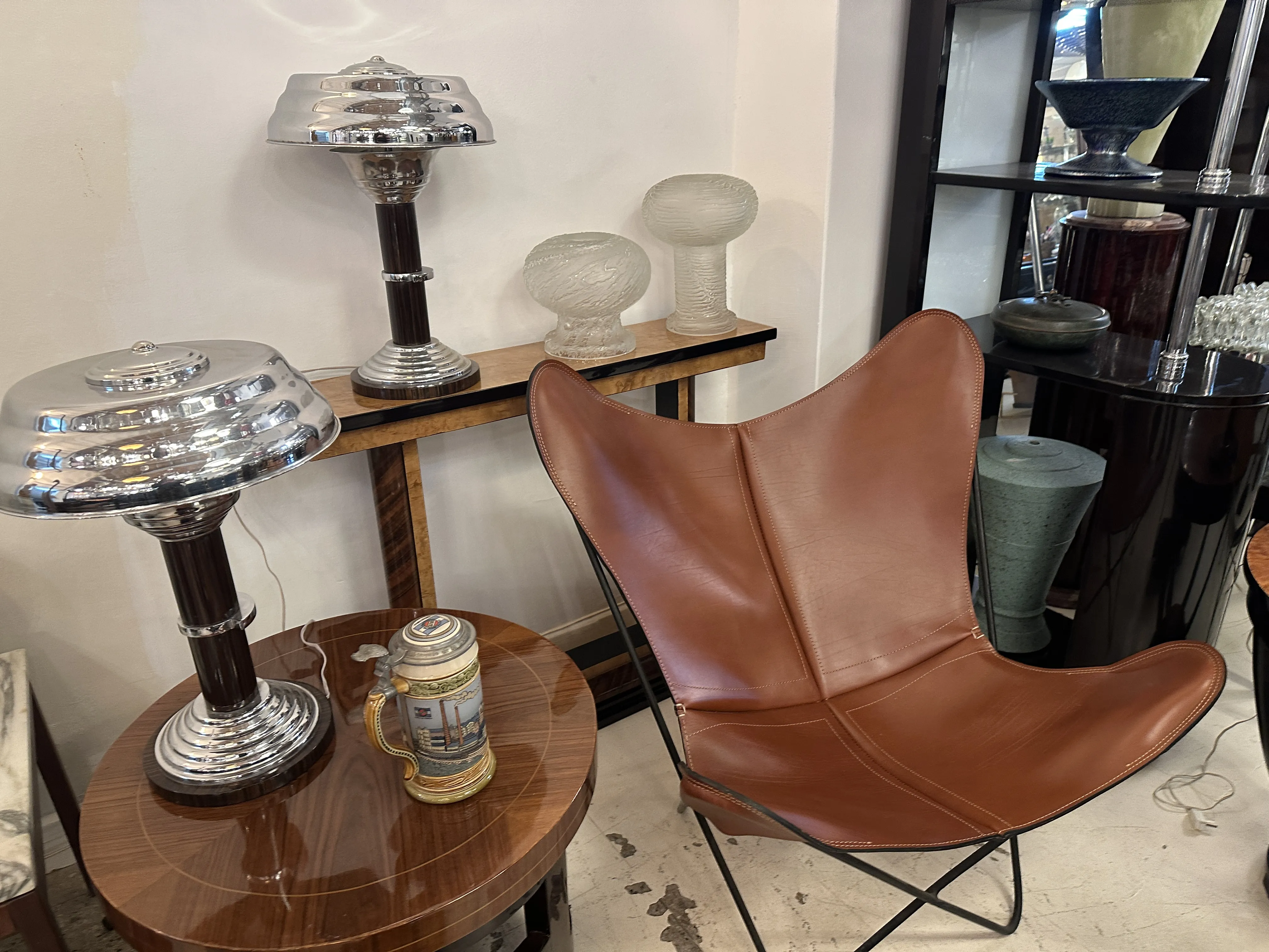 Antique lamps and ceramic items on a table