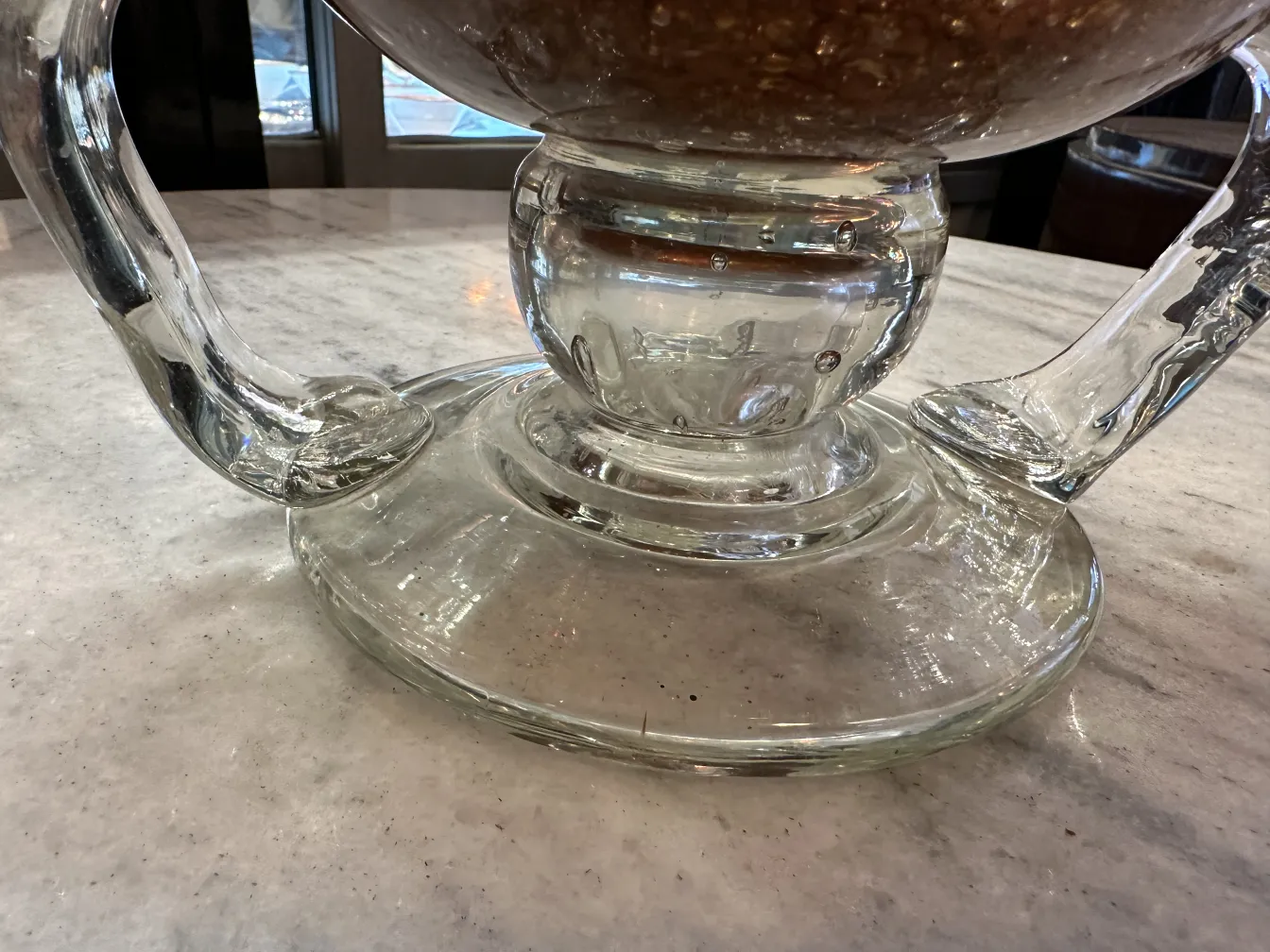 Antique glass with brown design and decorative details