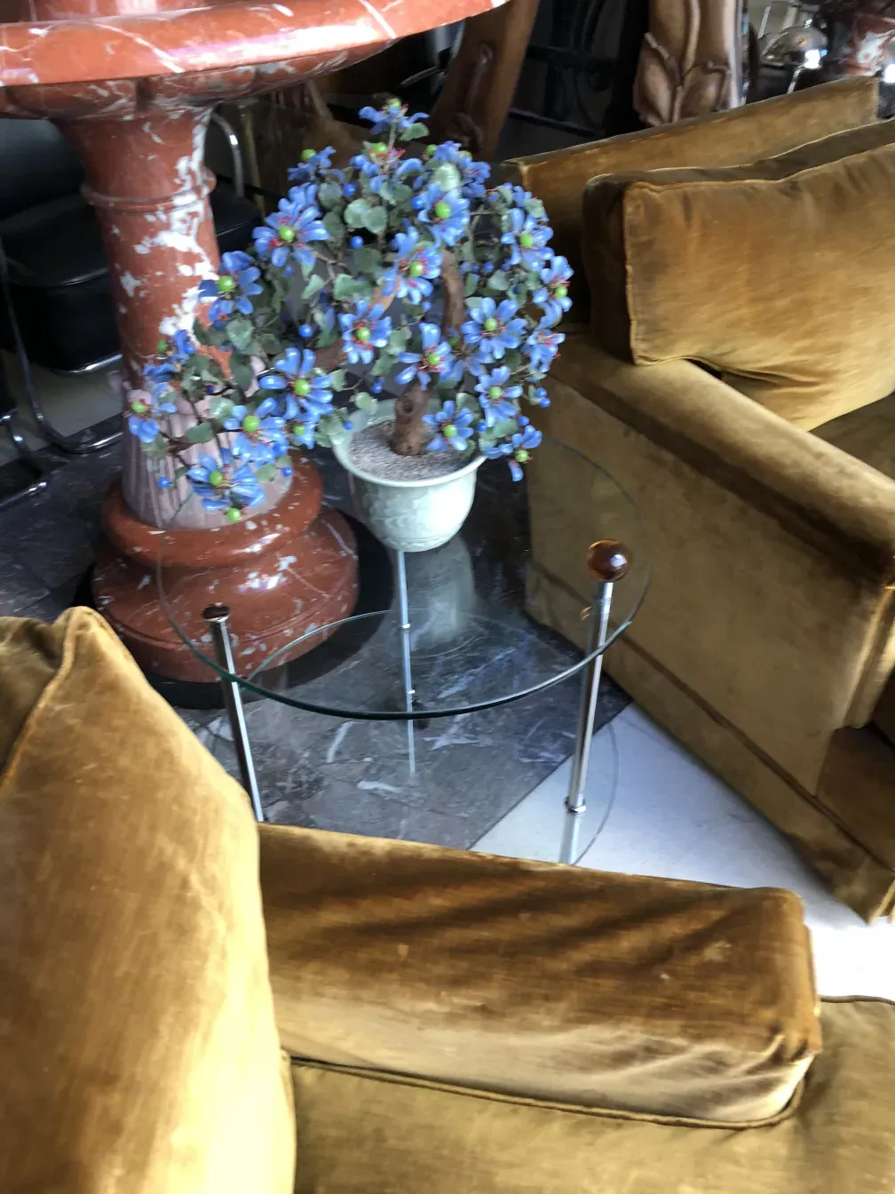 Antique decorative bonsai with blue flowers and ceramic base