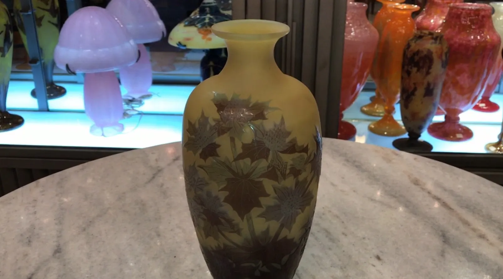 Antique signed Gallé vase with engraved flowers, decorative and elegant.