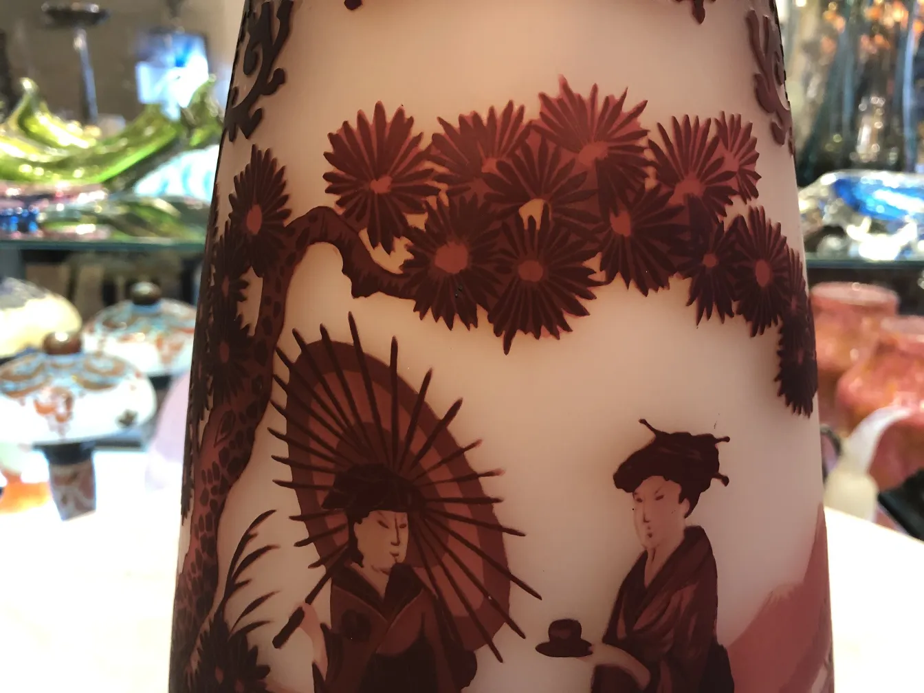 antique glass featuring figures and landscape design