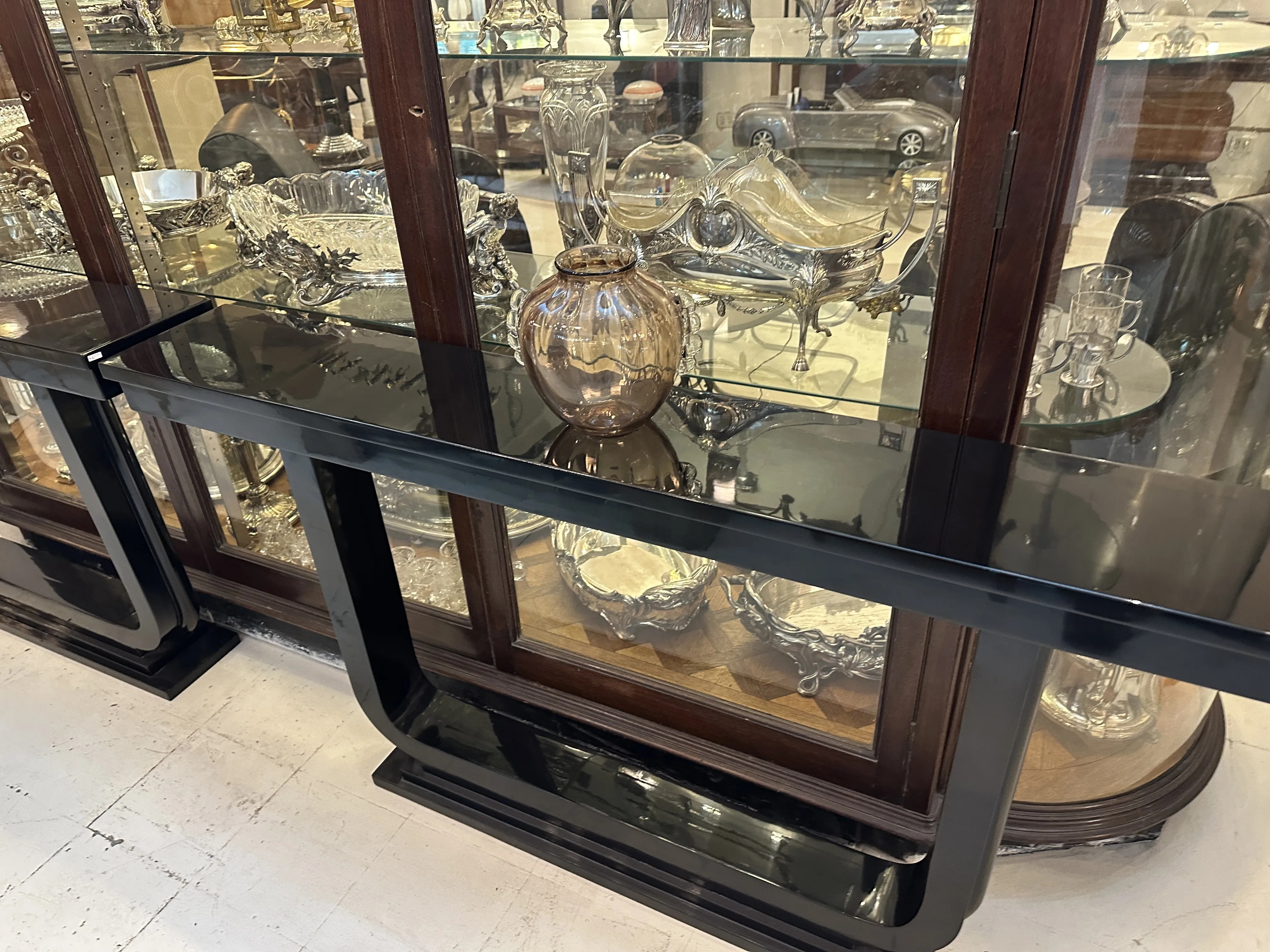 antique decorative Murano vase in a display case with elegant shapes and glimmers