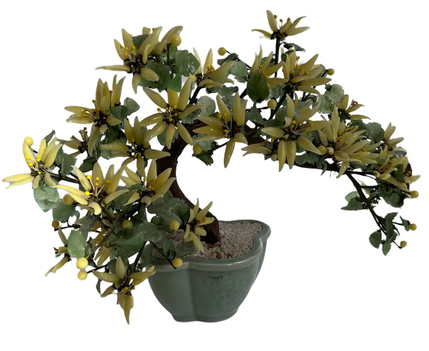 Antique bonsai with yellow flowers in decorative pot