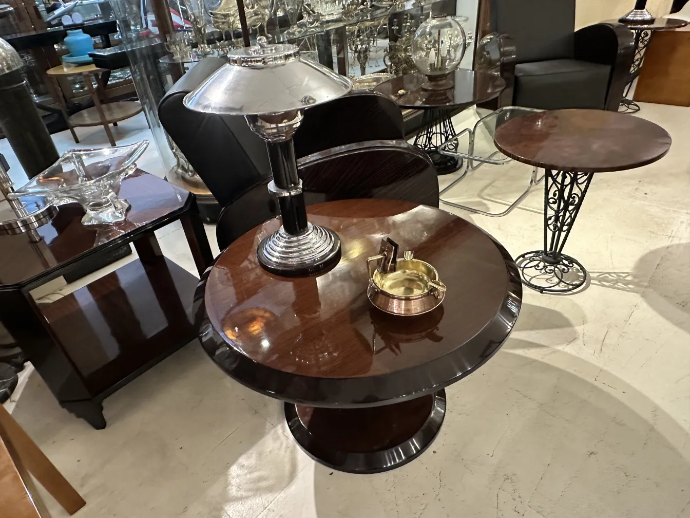 Antique ashtray on table with black surface