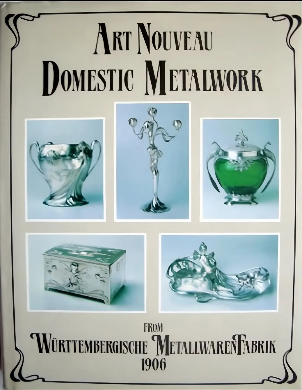 Antique card tray WMF featuring elegant design and subtle details, surrounded by other antique items.