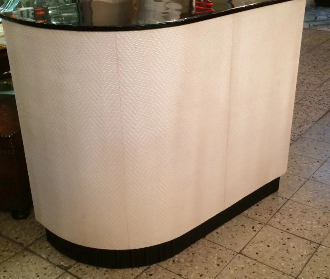 Antique bar with curved design and glossy surface